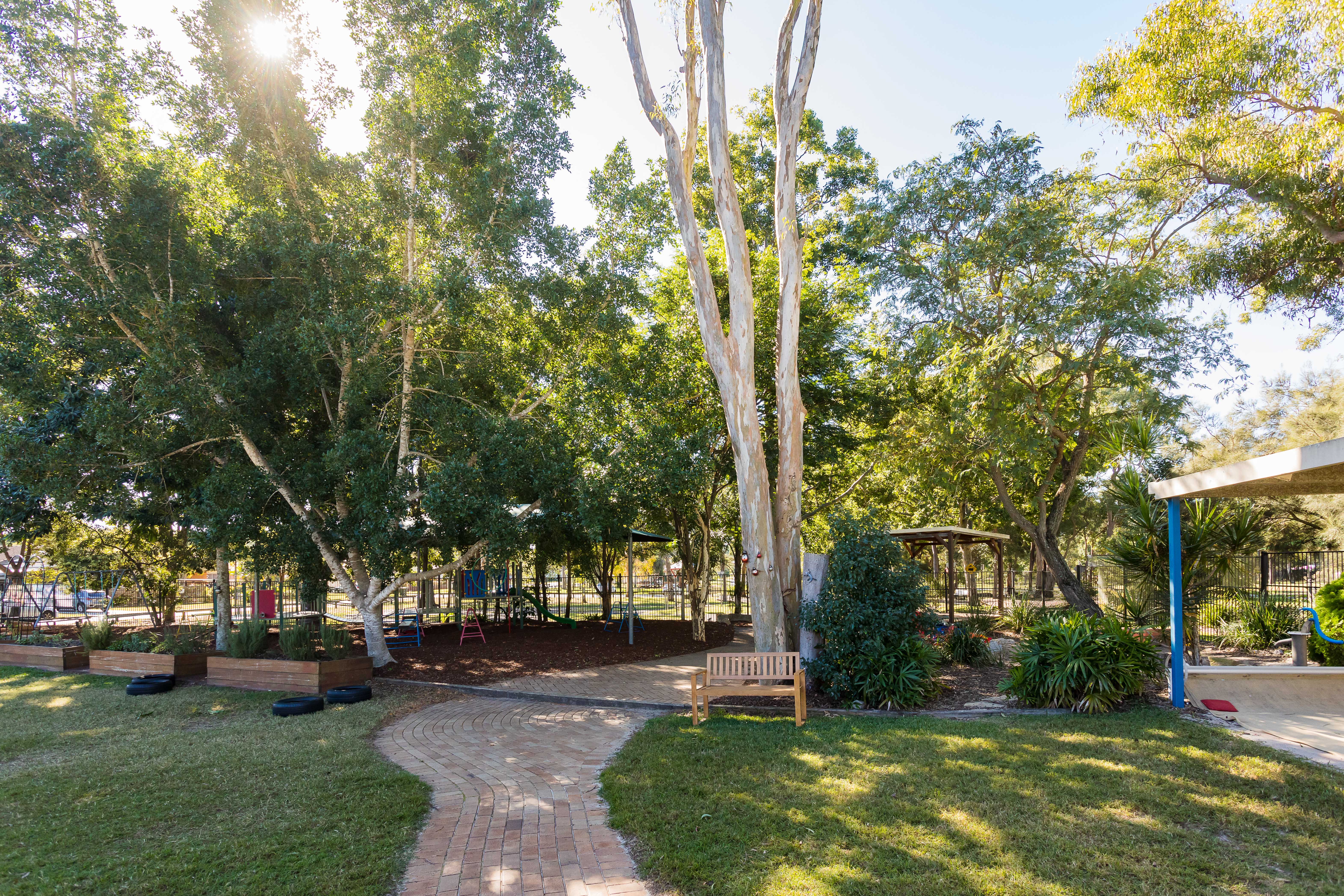 large outdoor area with big trees