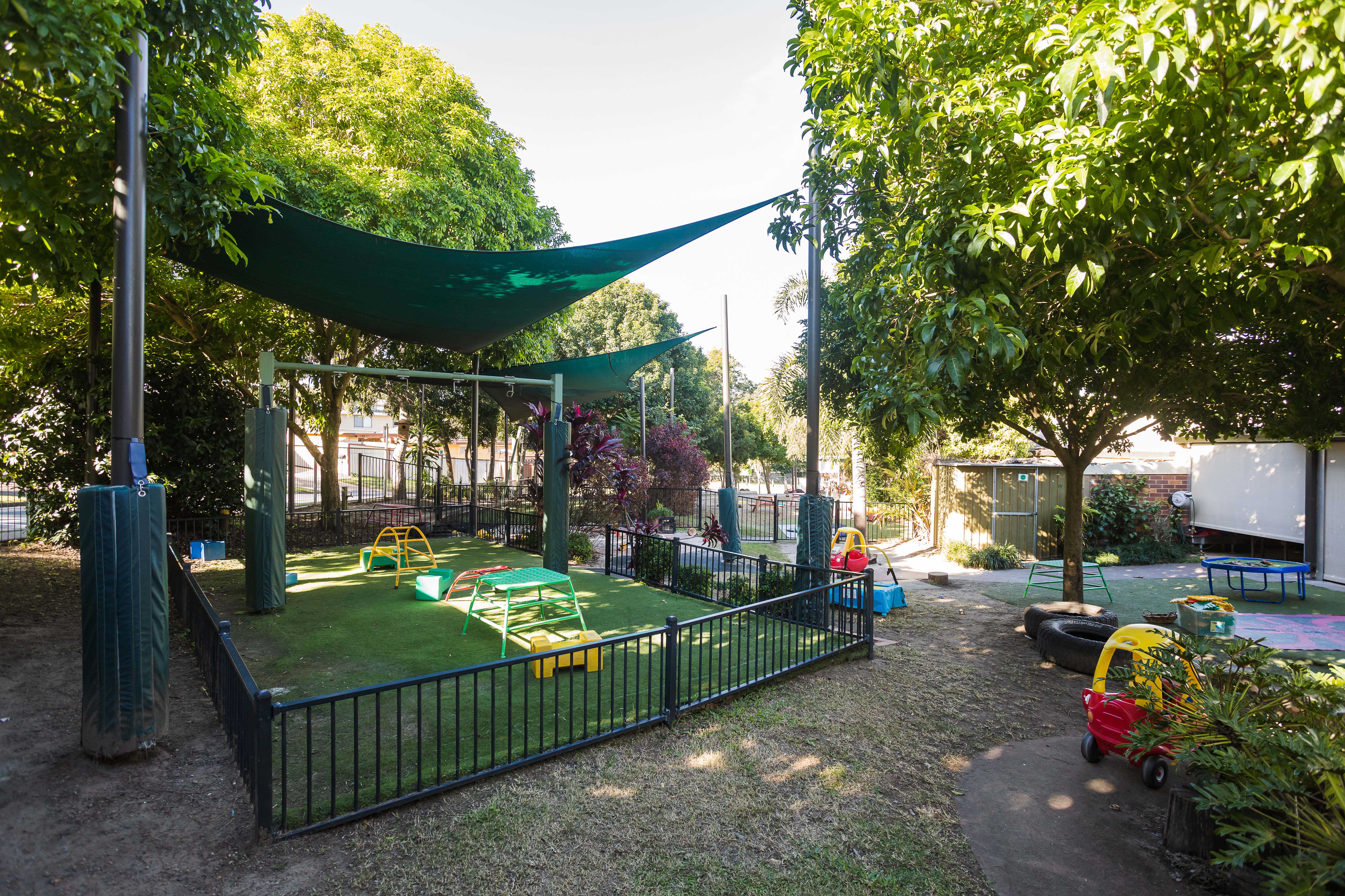 large shaded playground and garden