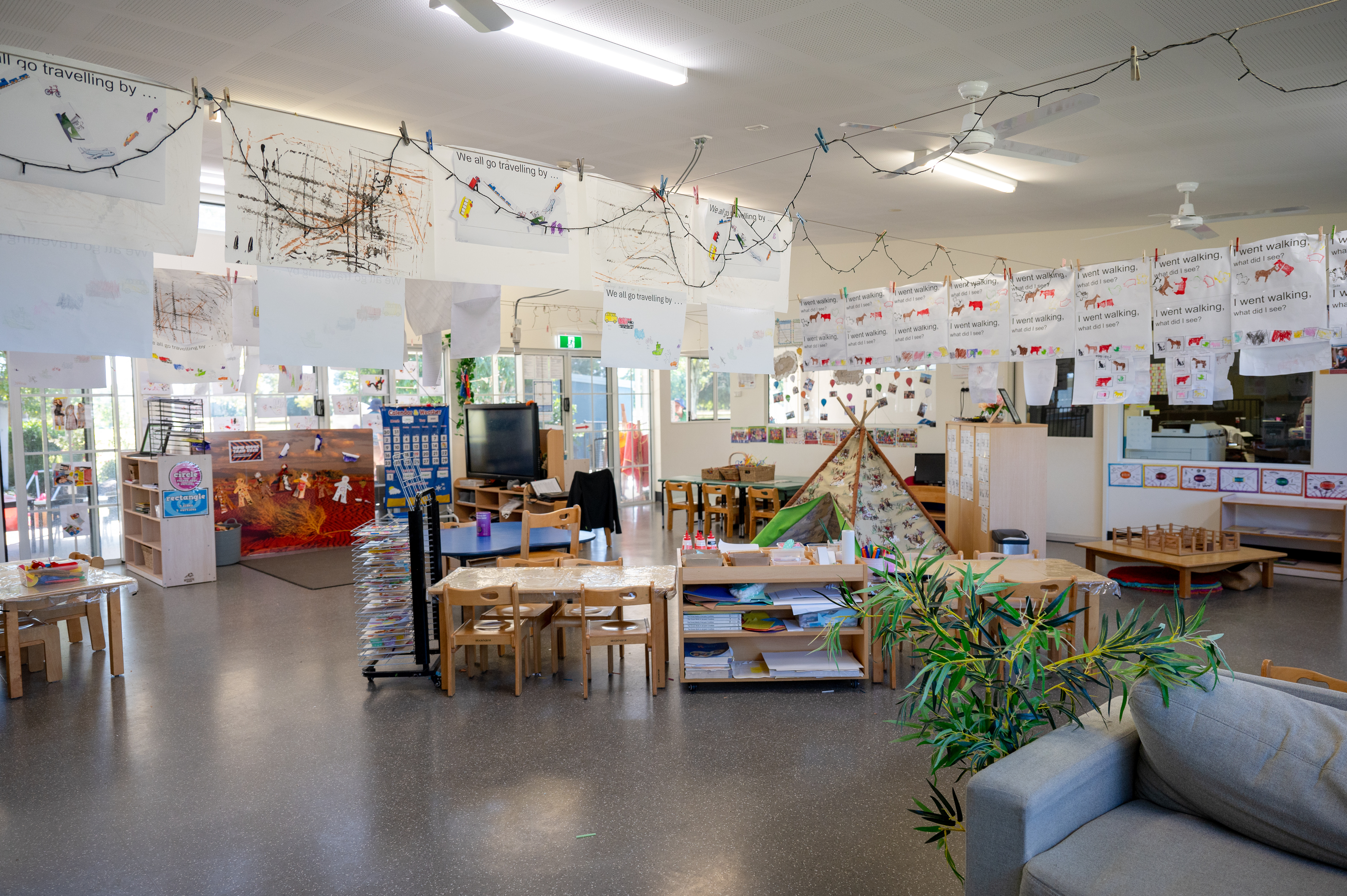 Large indoor space with artwork 