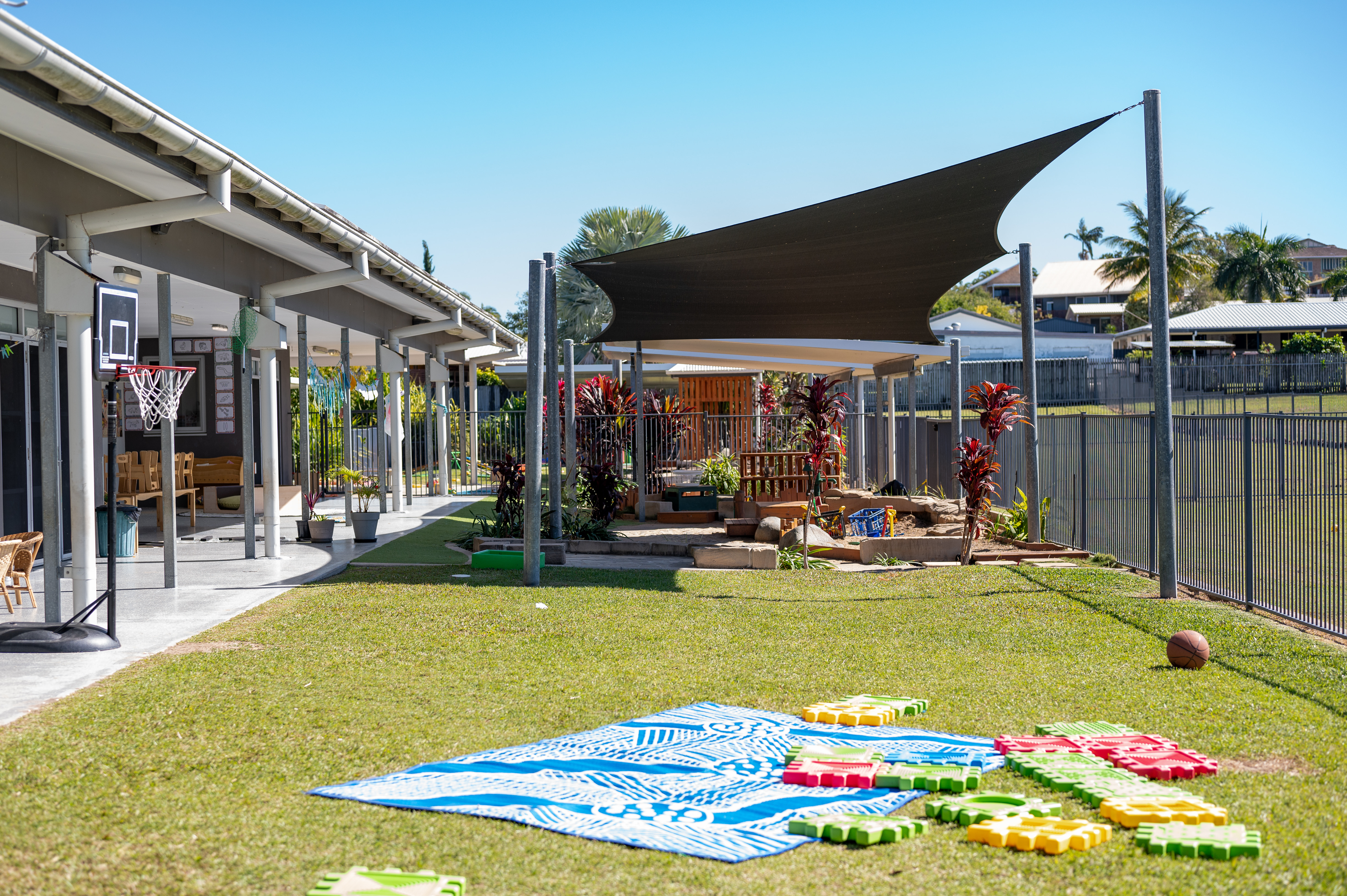 outdoor area showing shaded sandpit