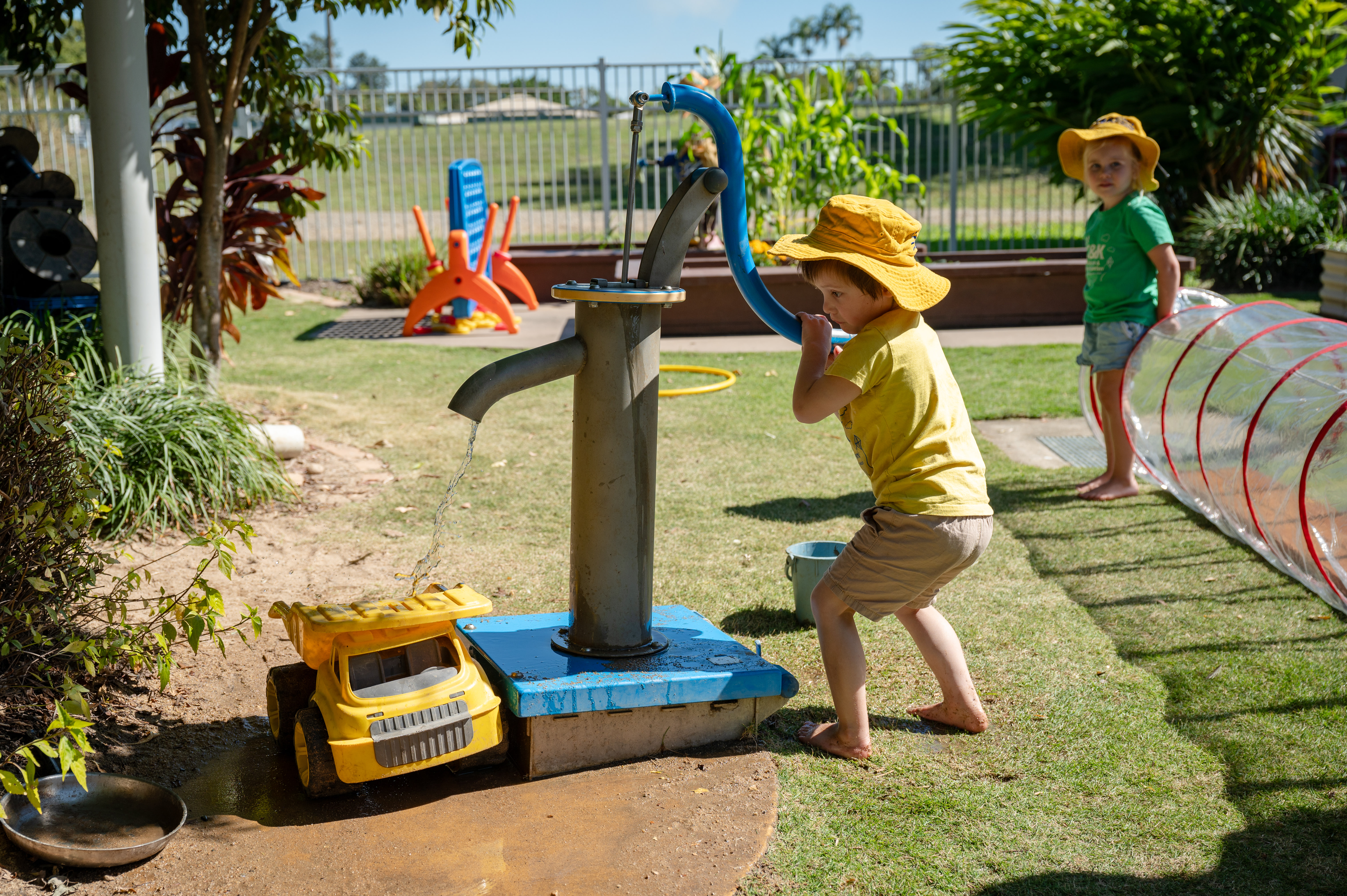 child playing with tap