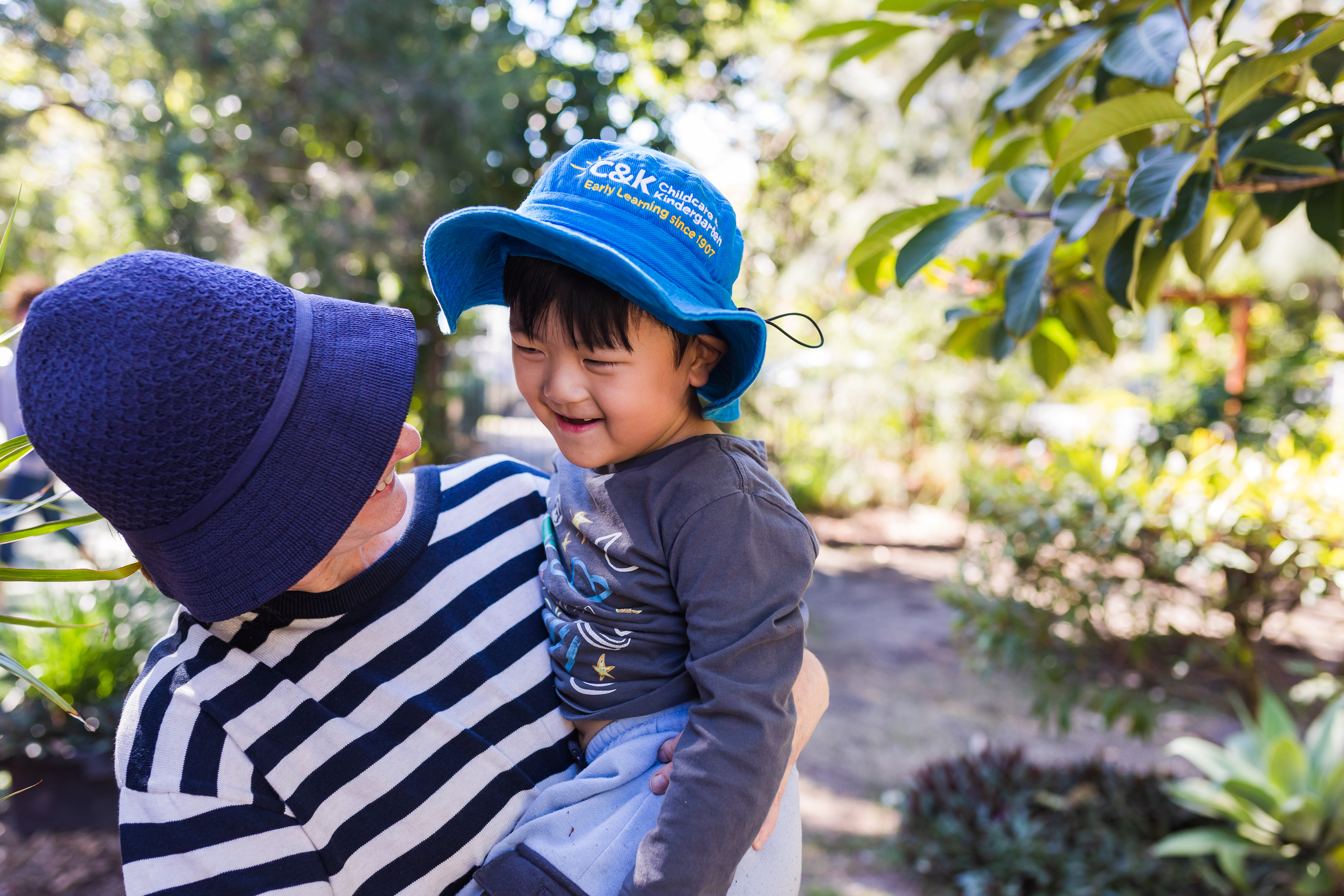 educator and child together outside
