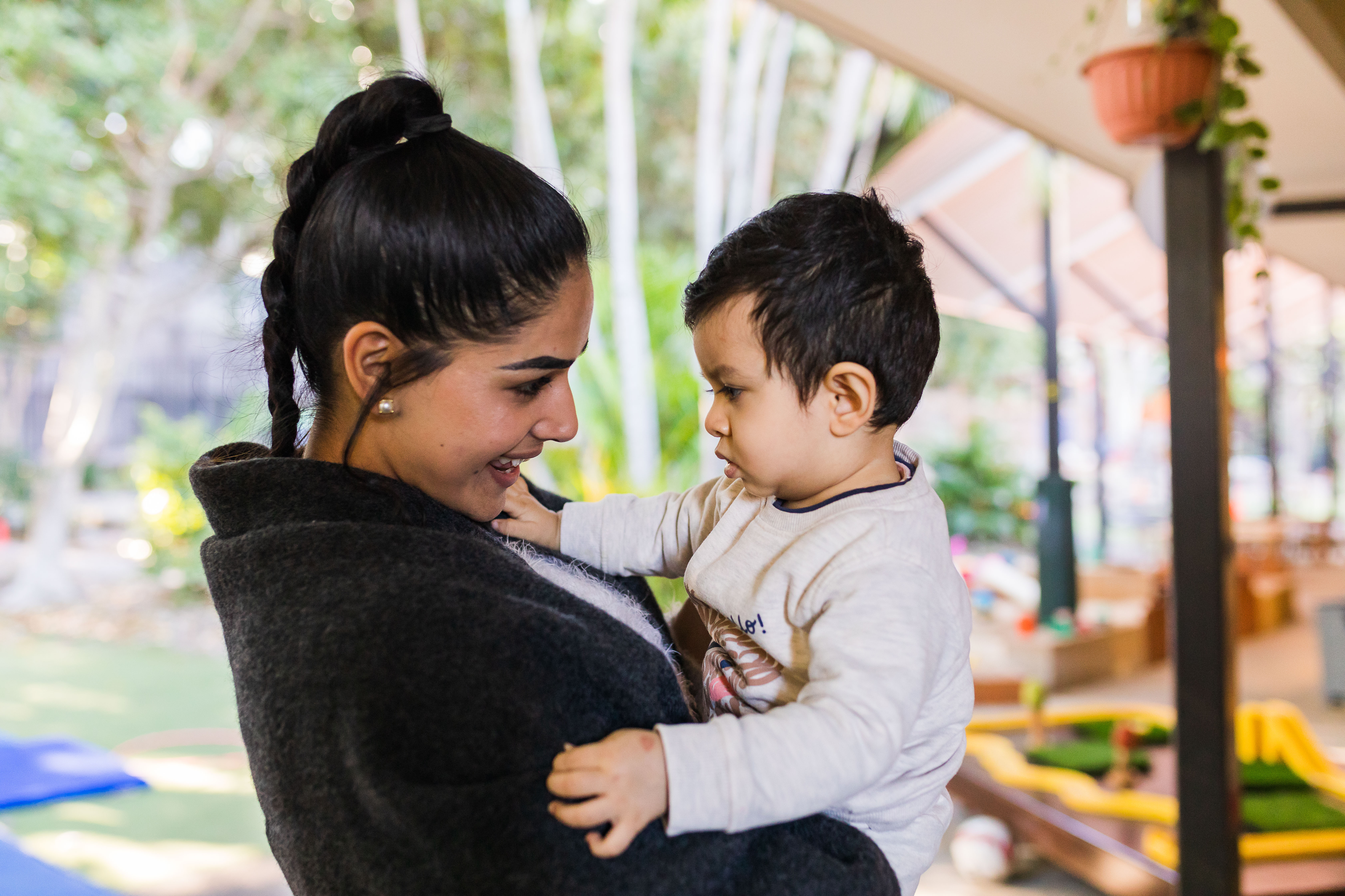 educator and baby together