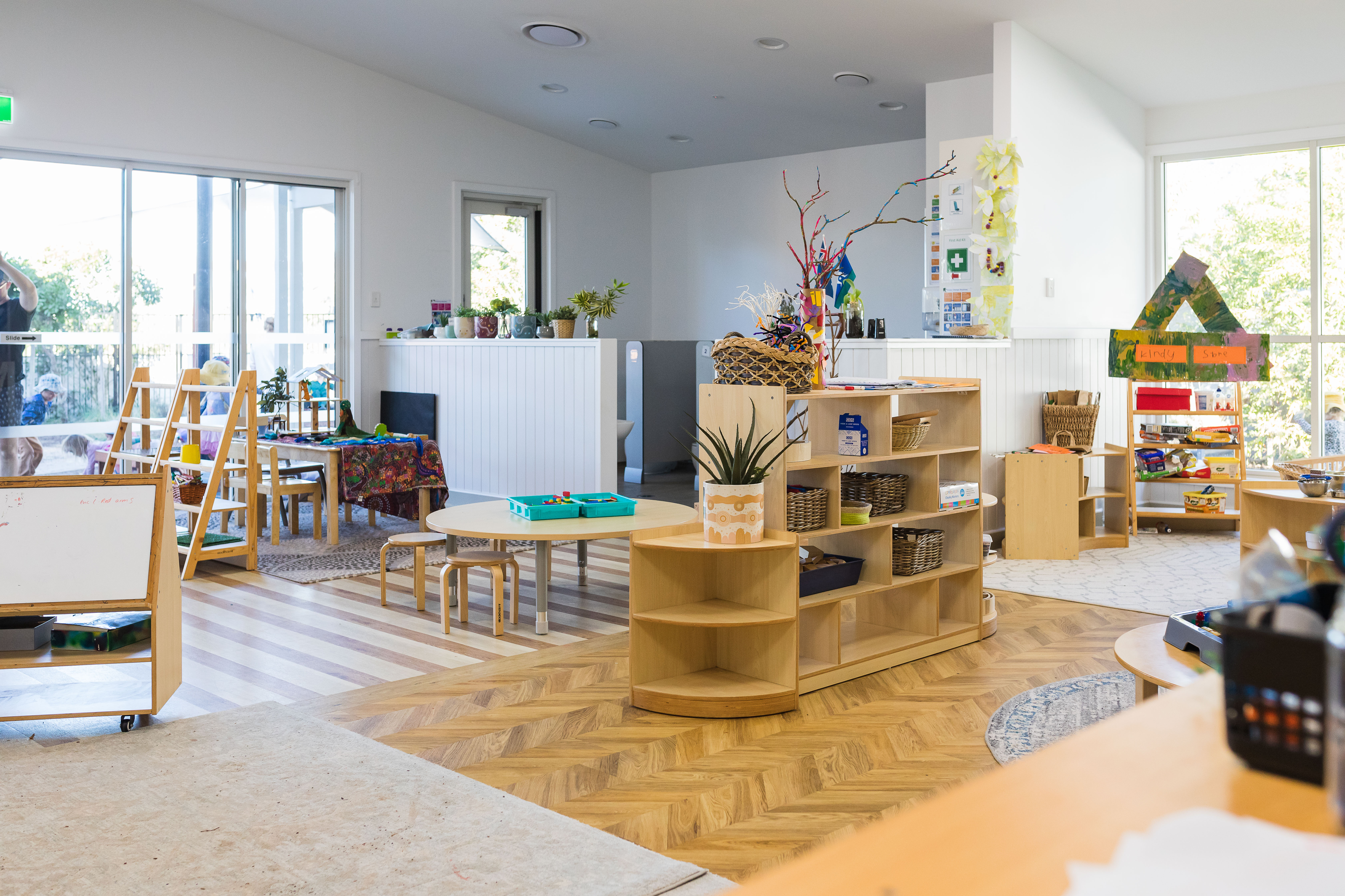 inside childcare with furniture and activities