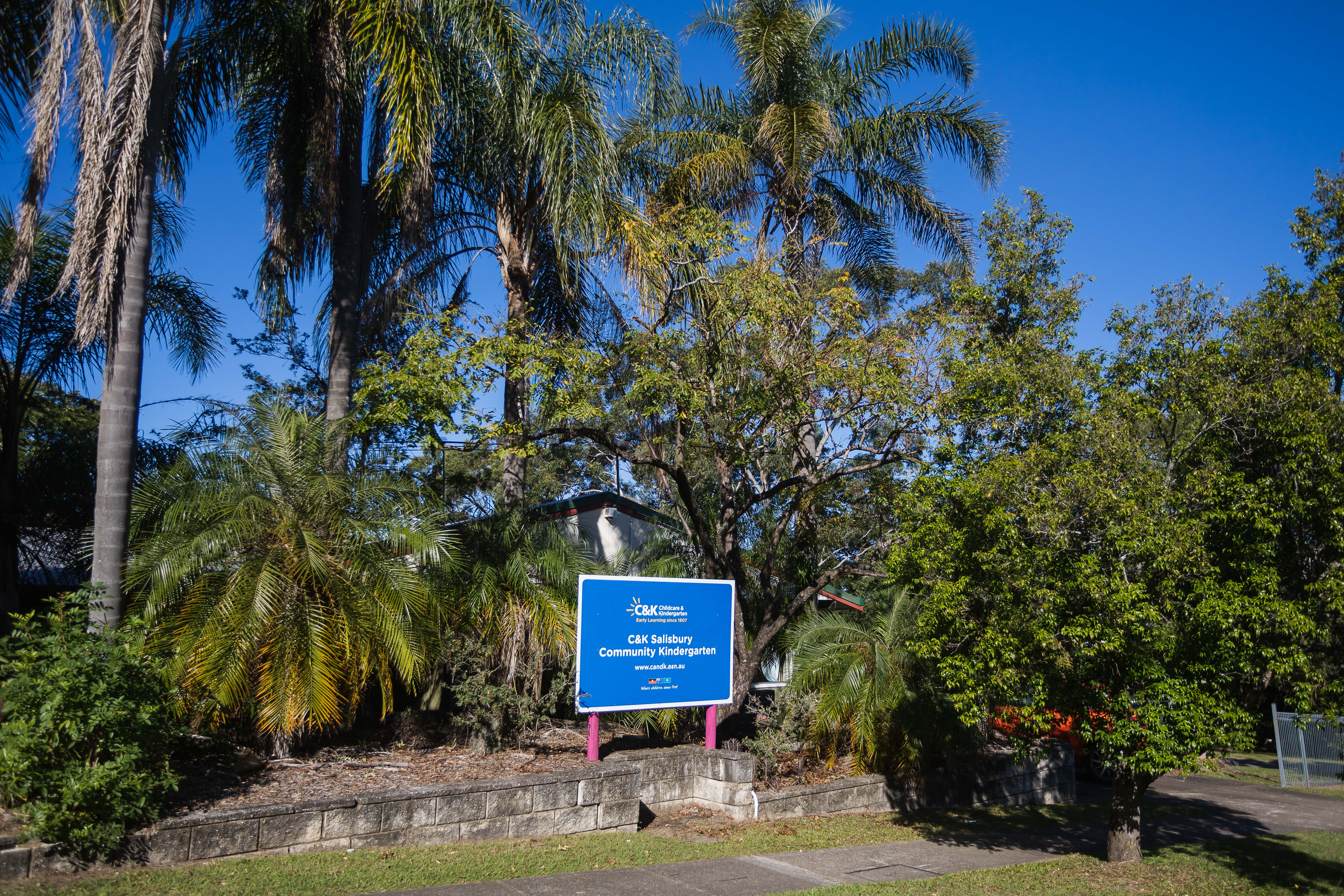 entrance to kindy with sign and garden