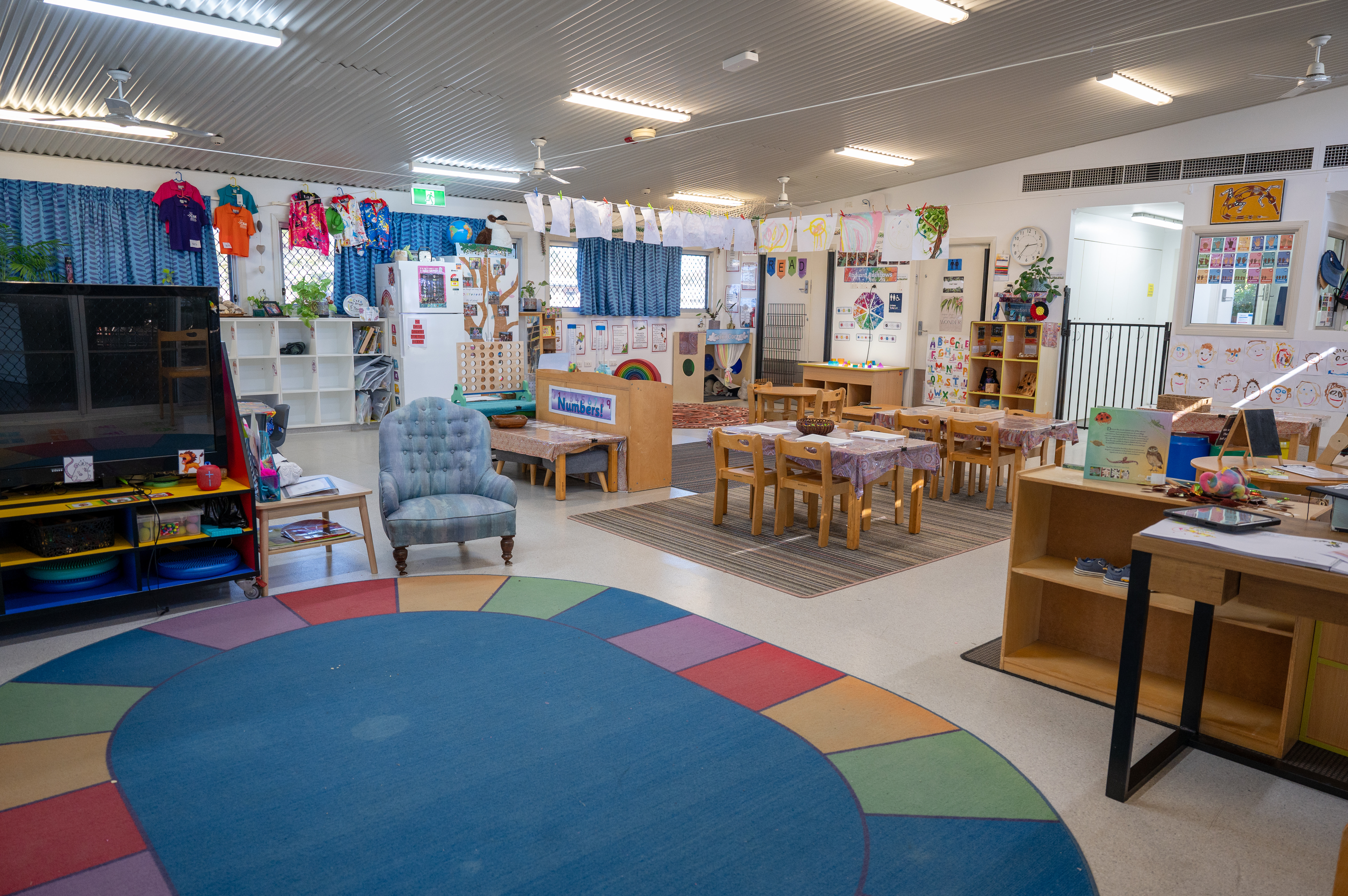 indoor area showing carpet area and tv