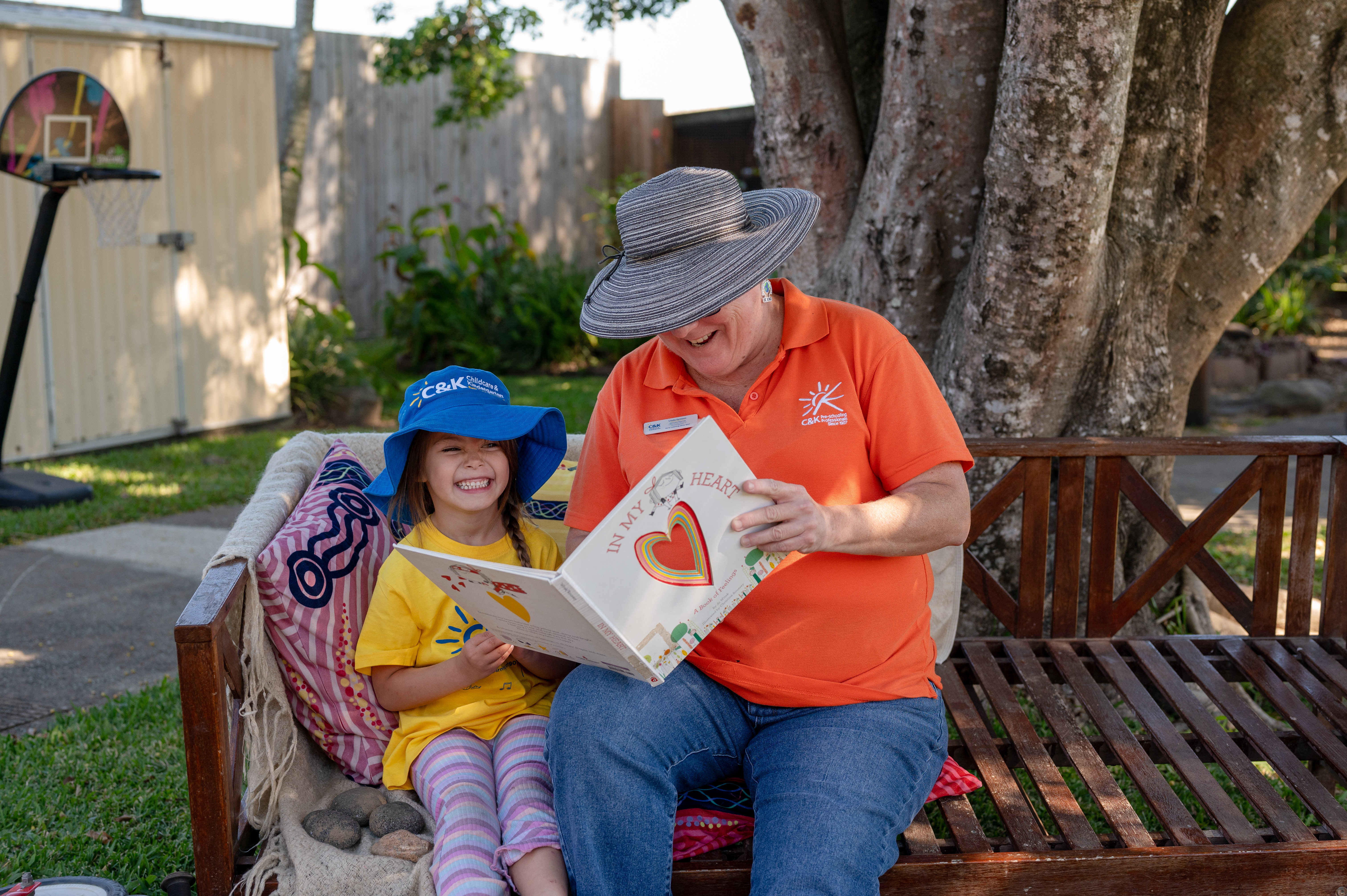 Educator reading book to child