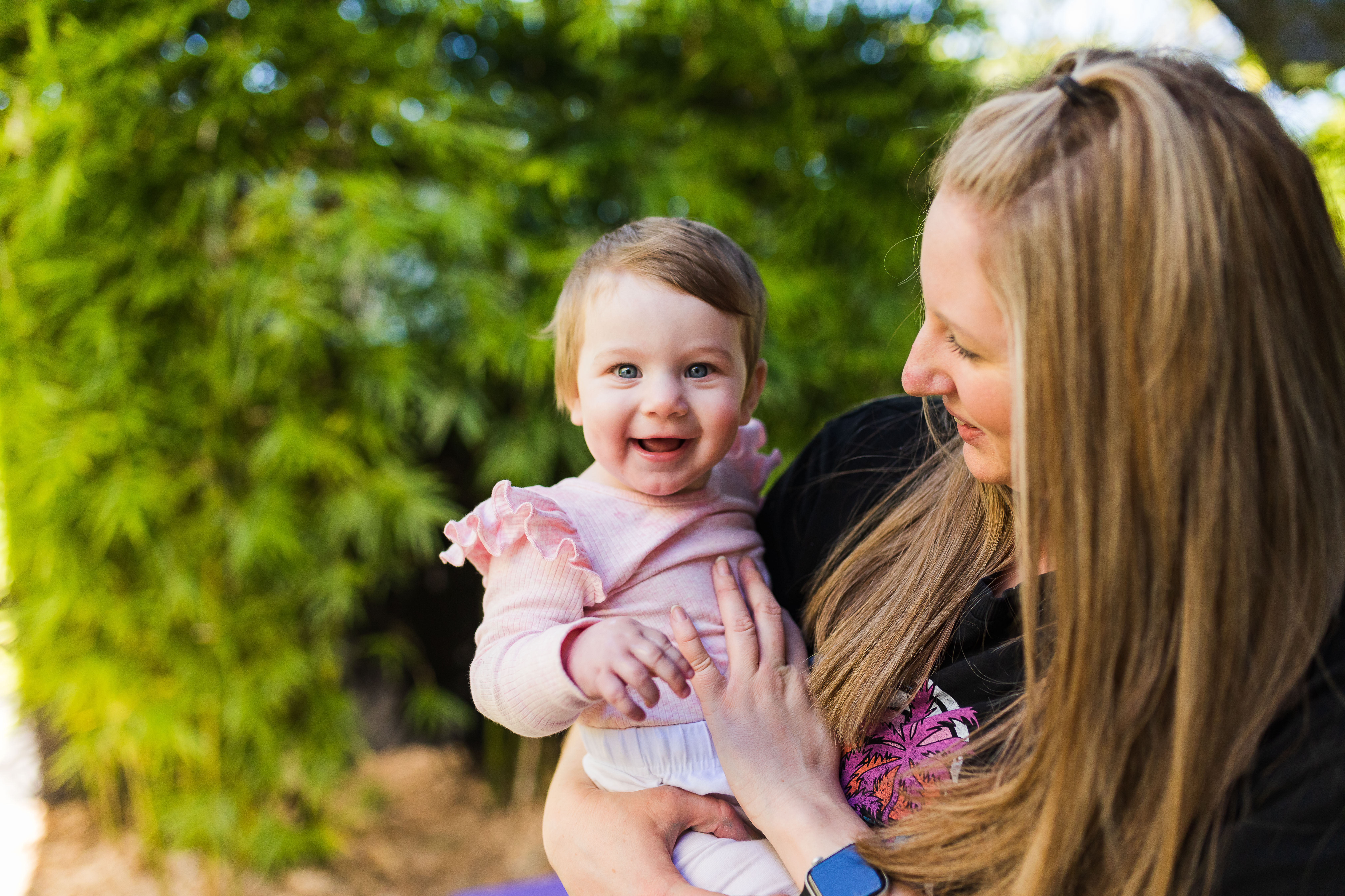 baby and educator together