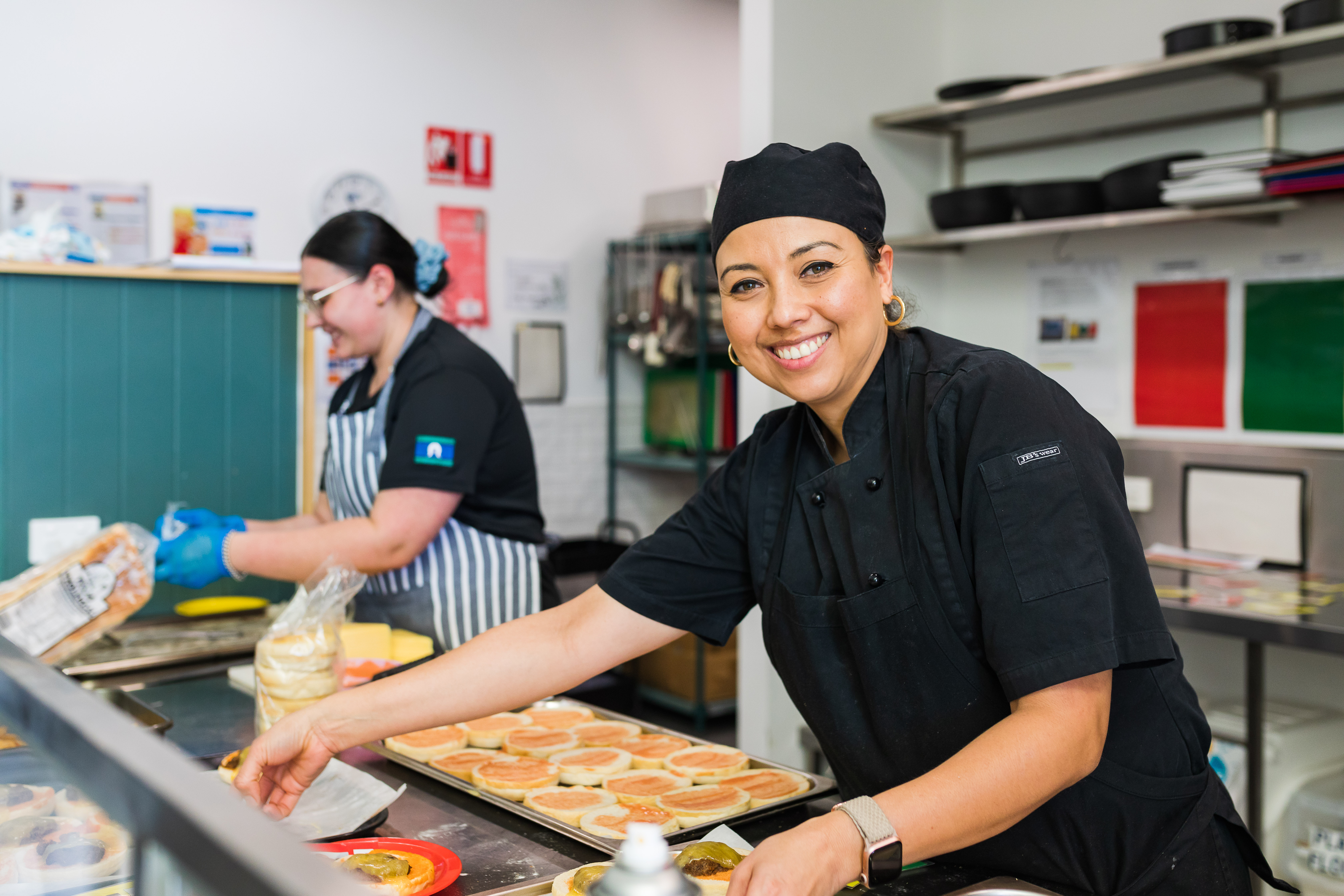 childcare cooks in kitchen