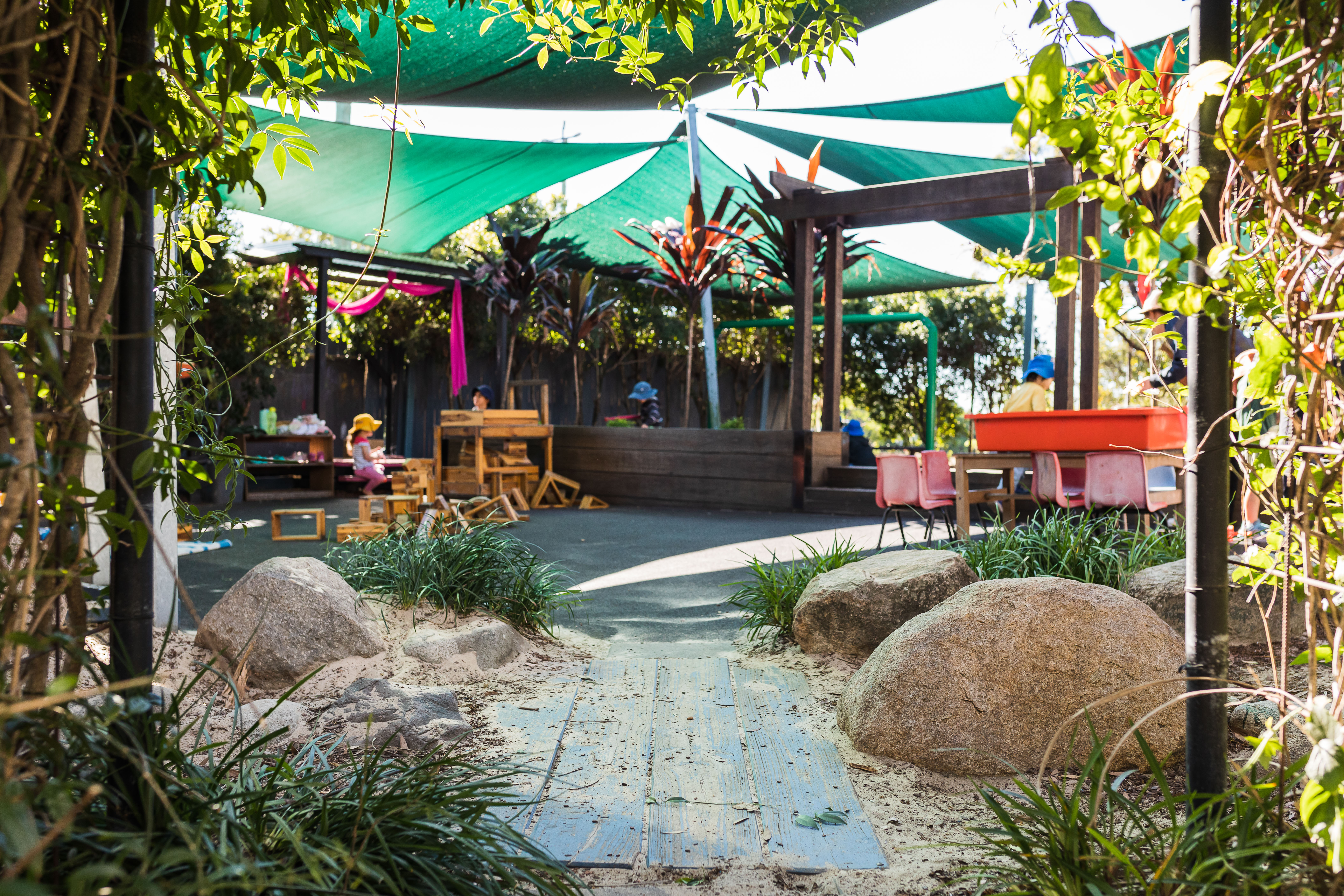 large shaded outdoor area and playground