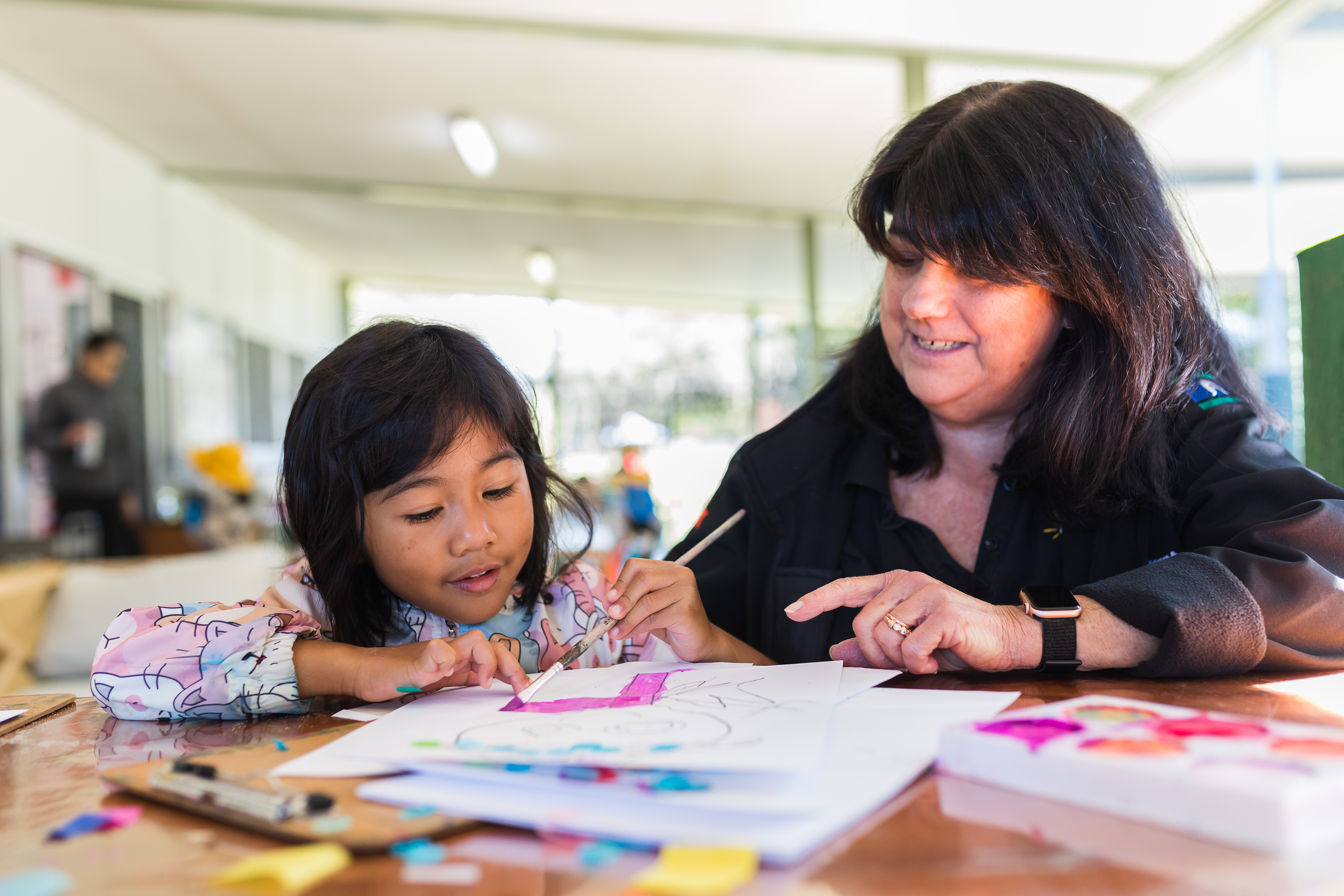 Director Sandy with kindy child