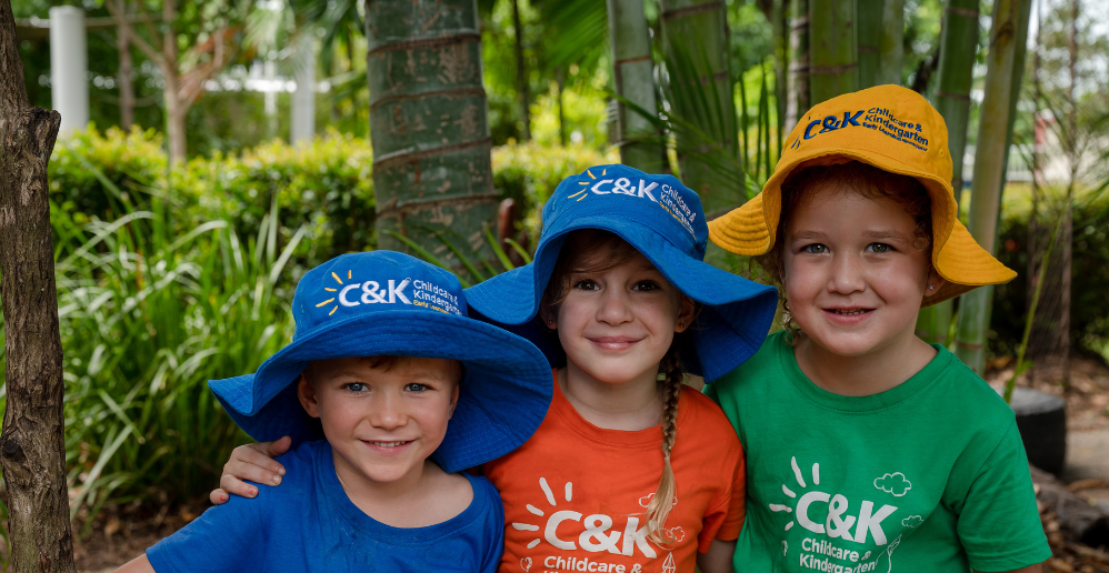 C&K happy children in tshirts and hats