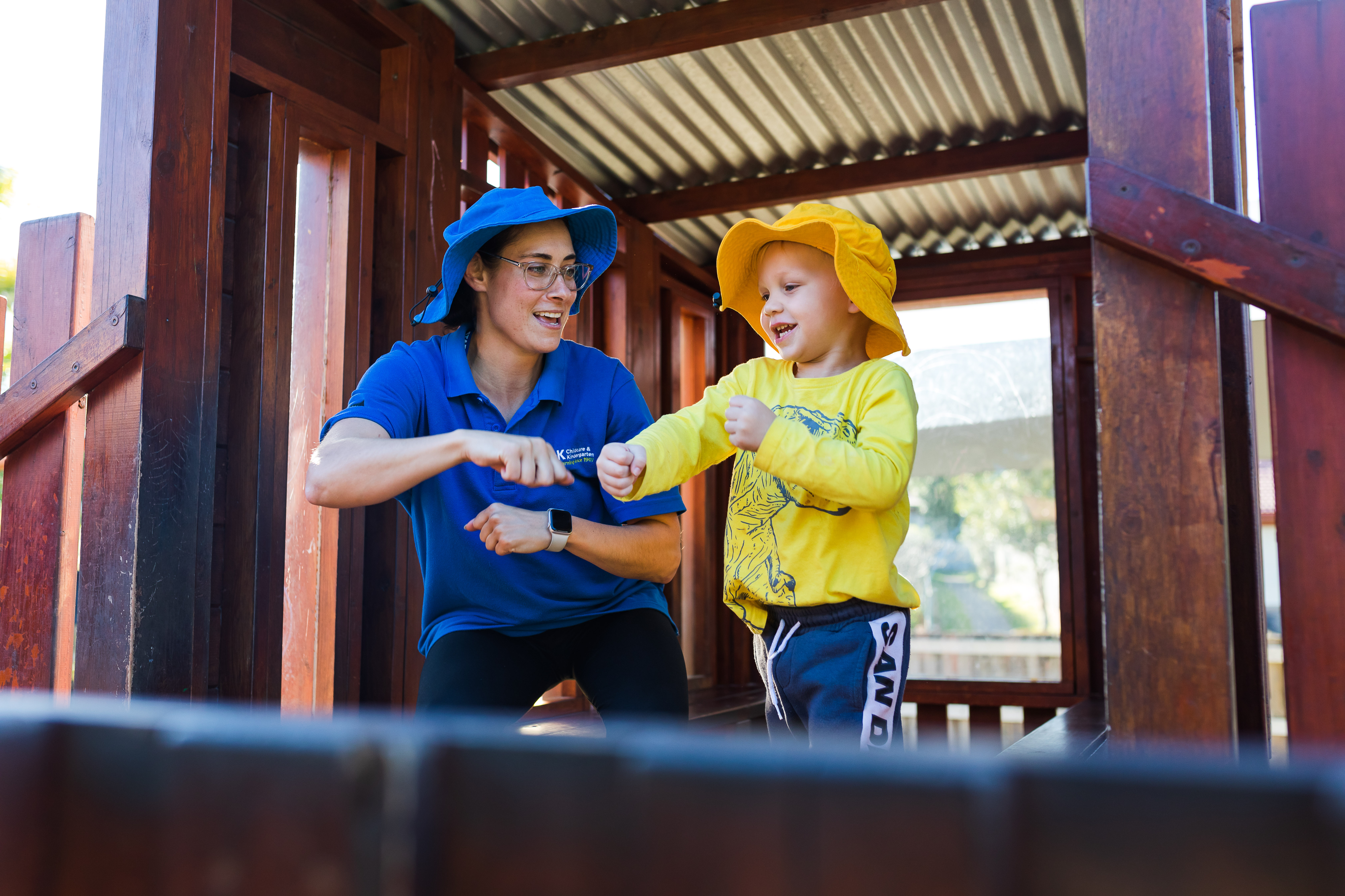 C&K Educator and child dancing together