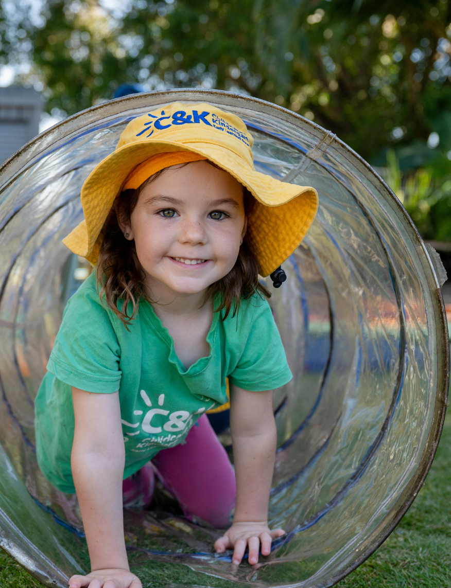 C&K Kindergarten Child playing in tunnel