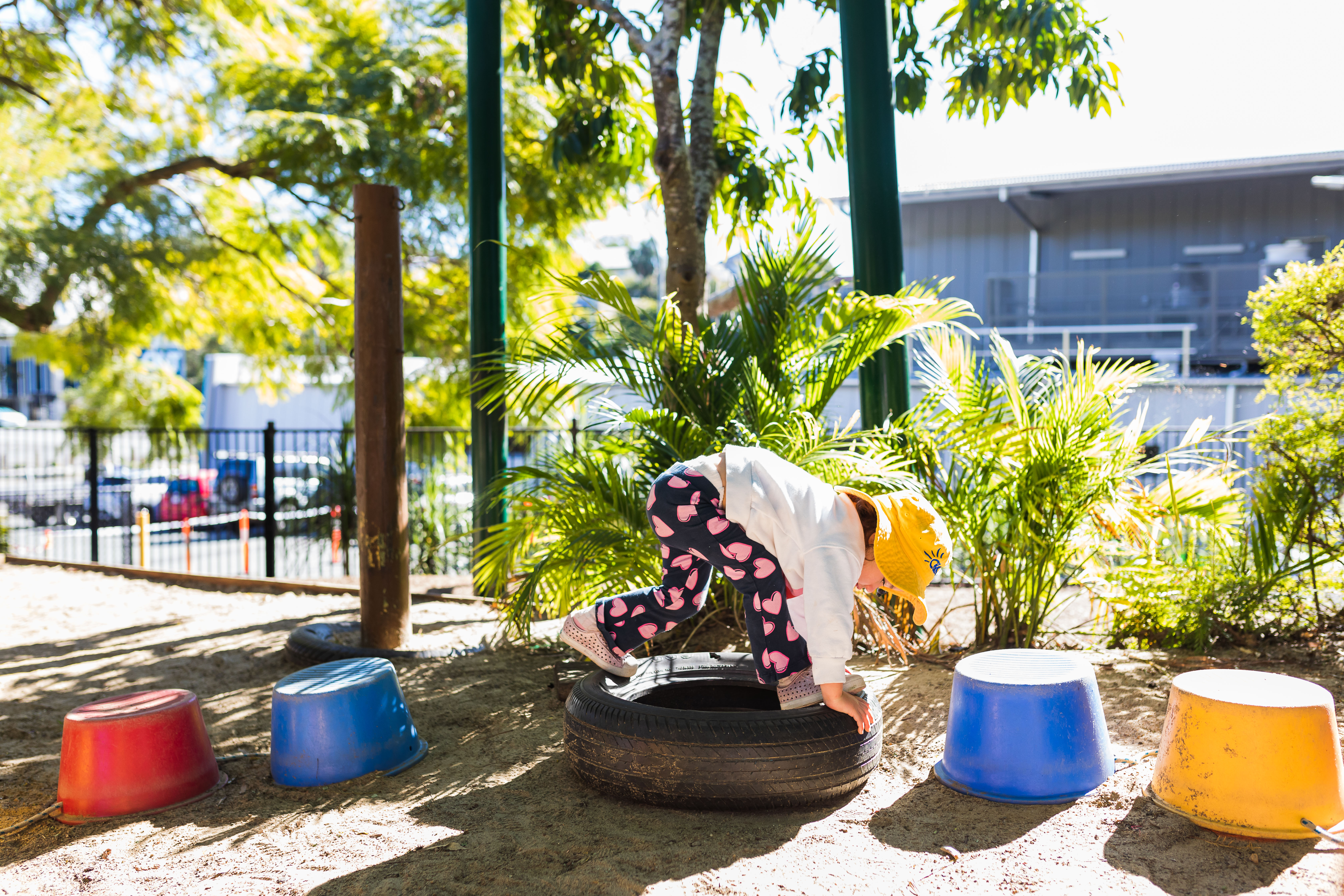Toddler playing outside