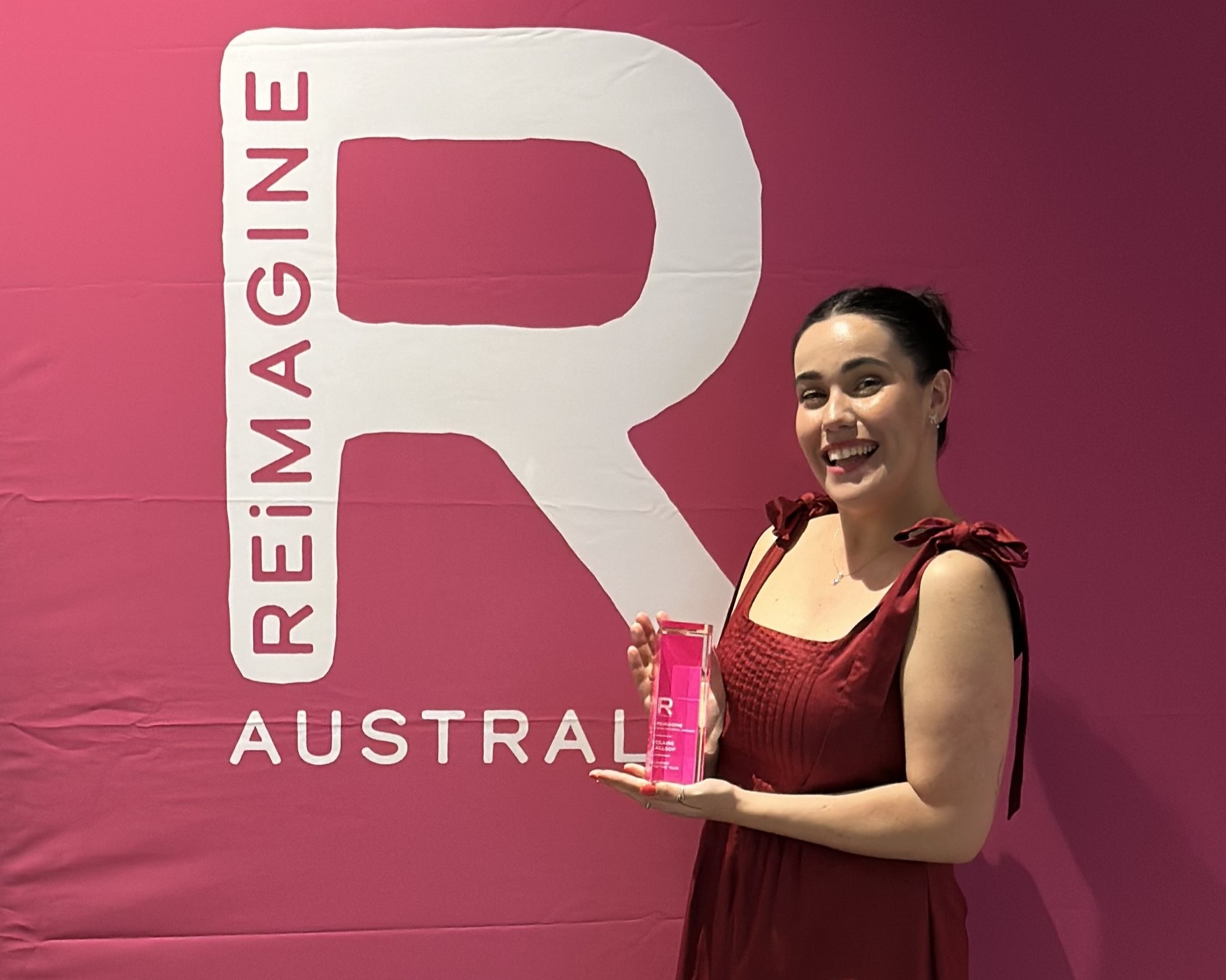 Claire Allsop with her award