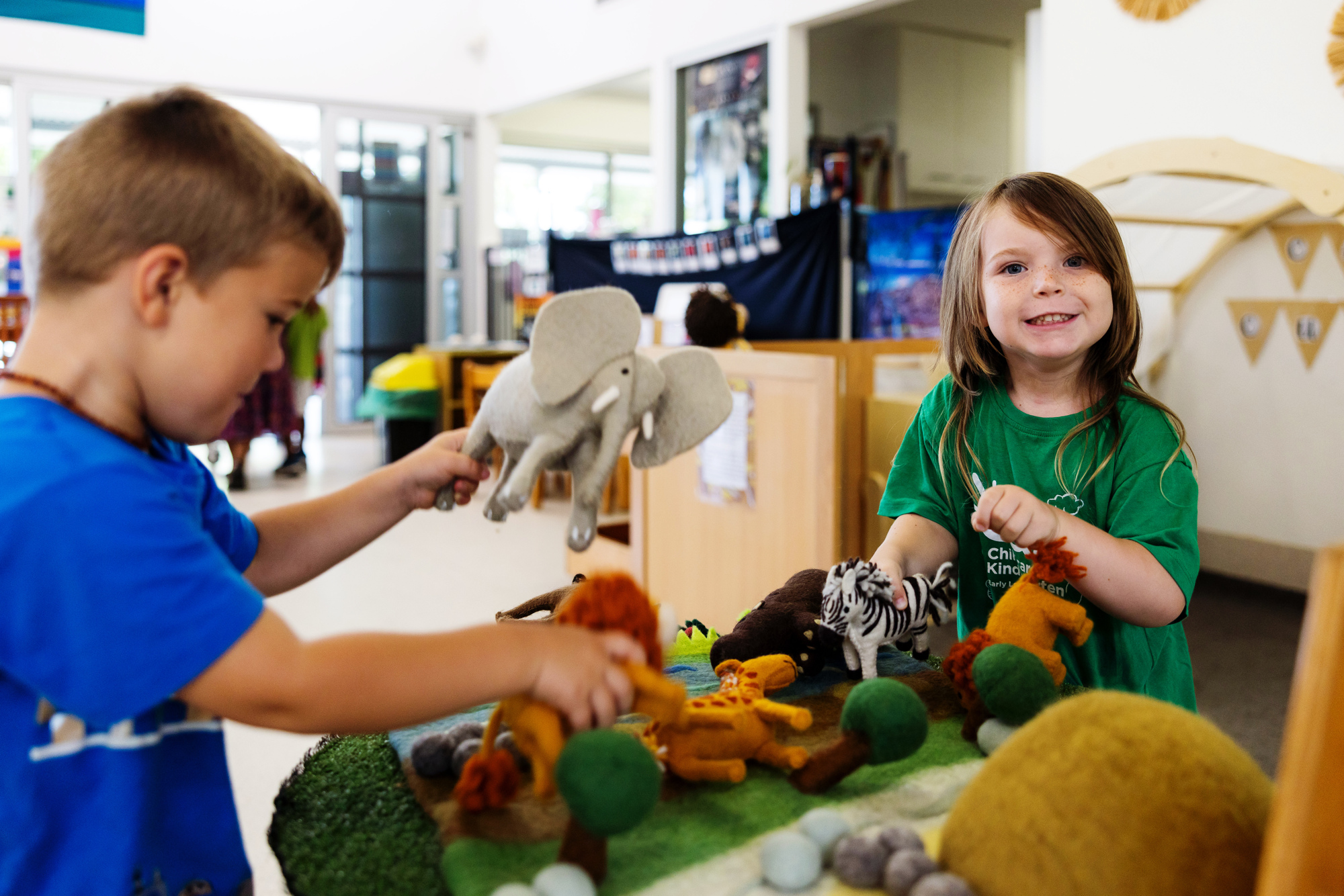Coomera Springs - children playing with toy animals