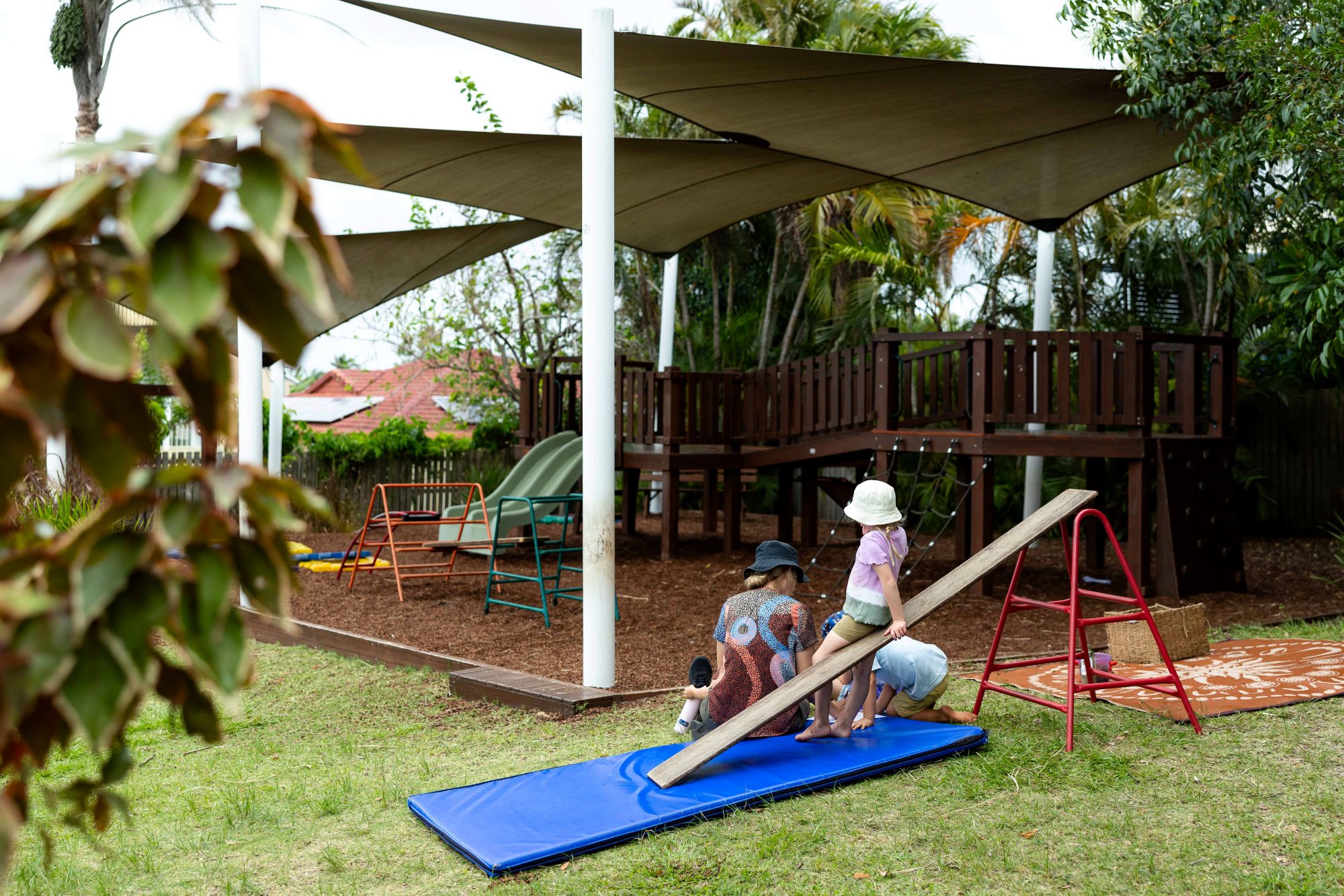C&K Mooloolaba - educator and children outside