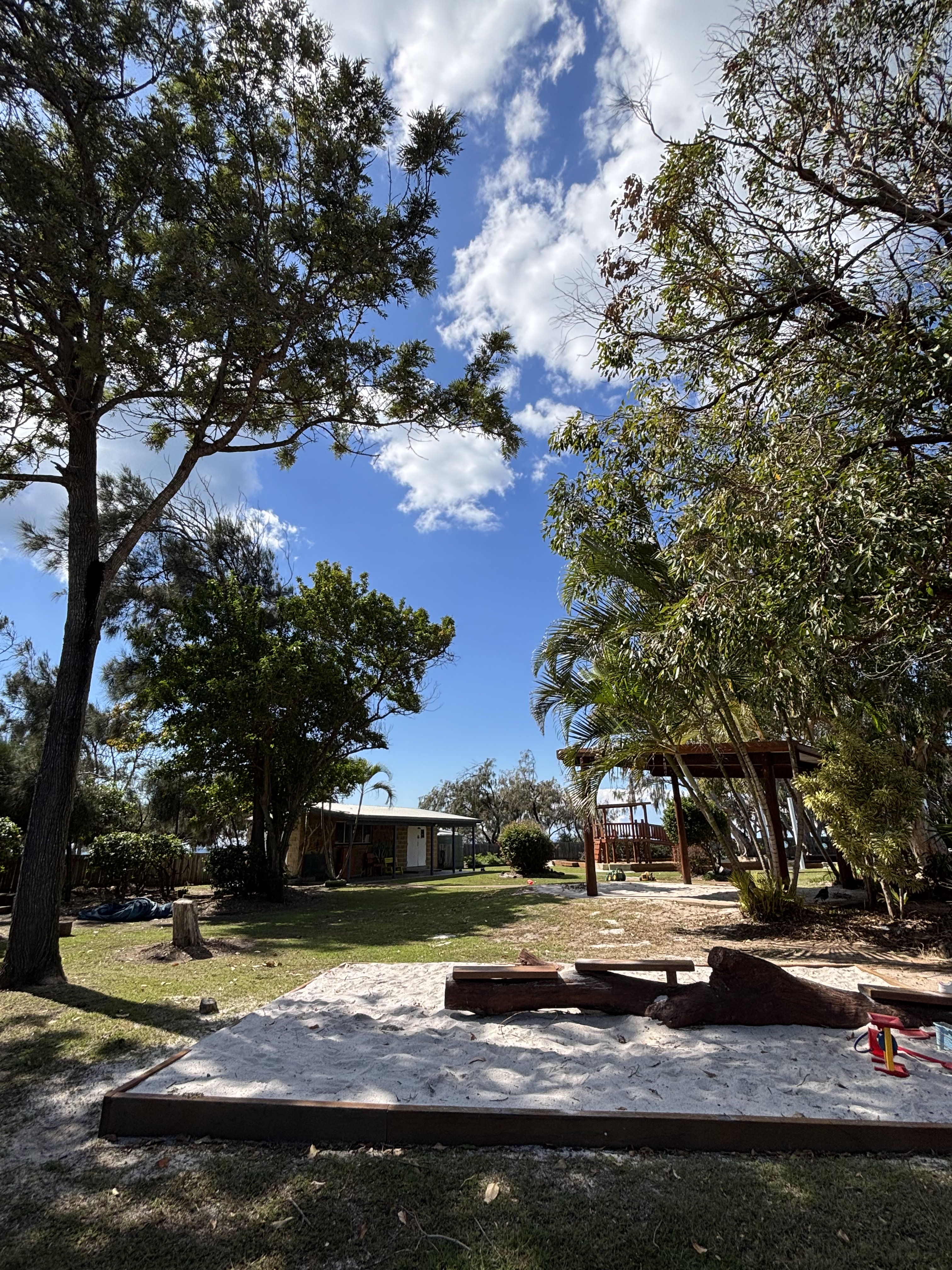 C&K Oaks Beach large leafy outdoor space and sandpit