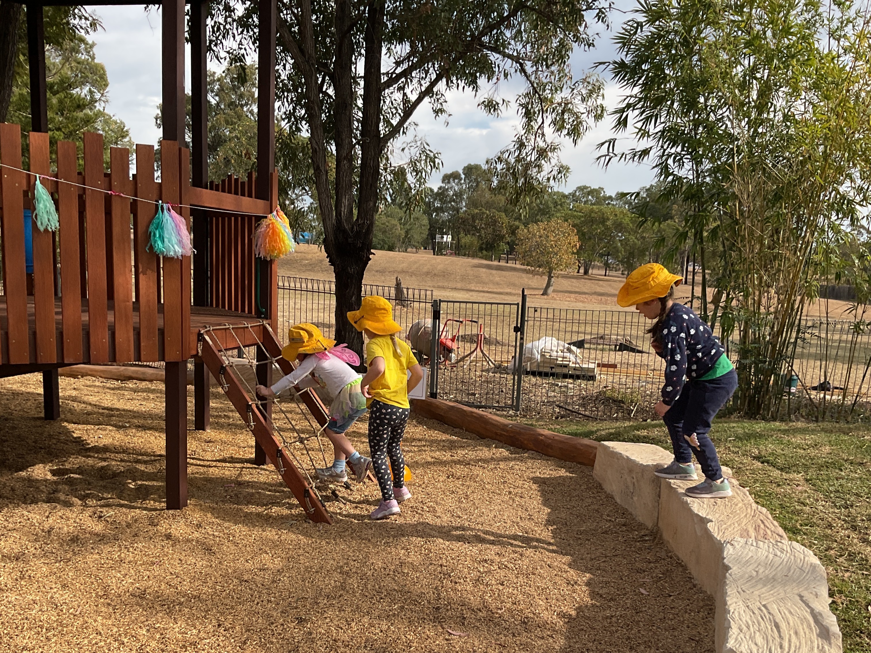 C&K Coo-Inda - children climbing the playground