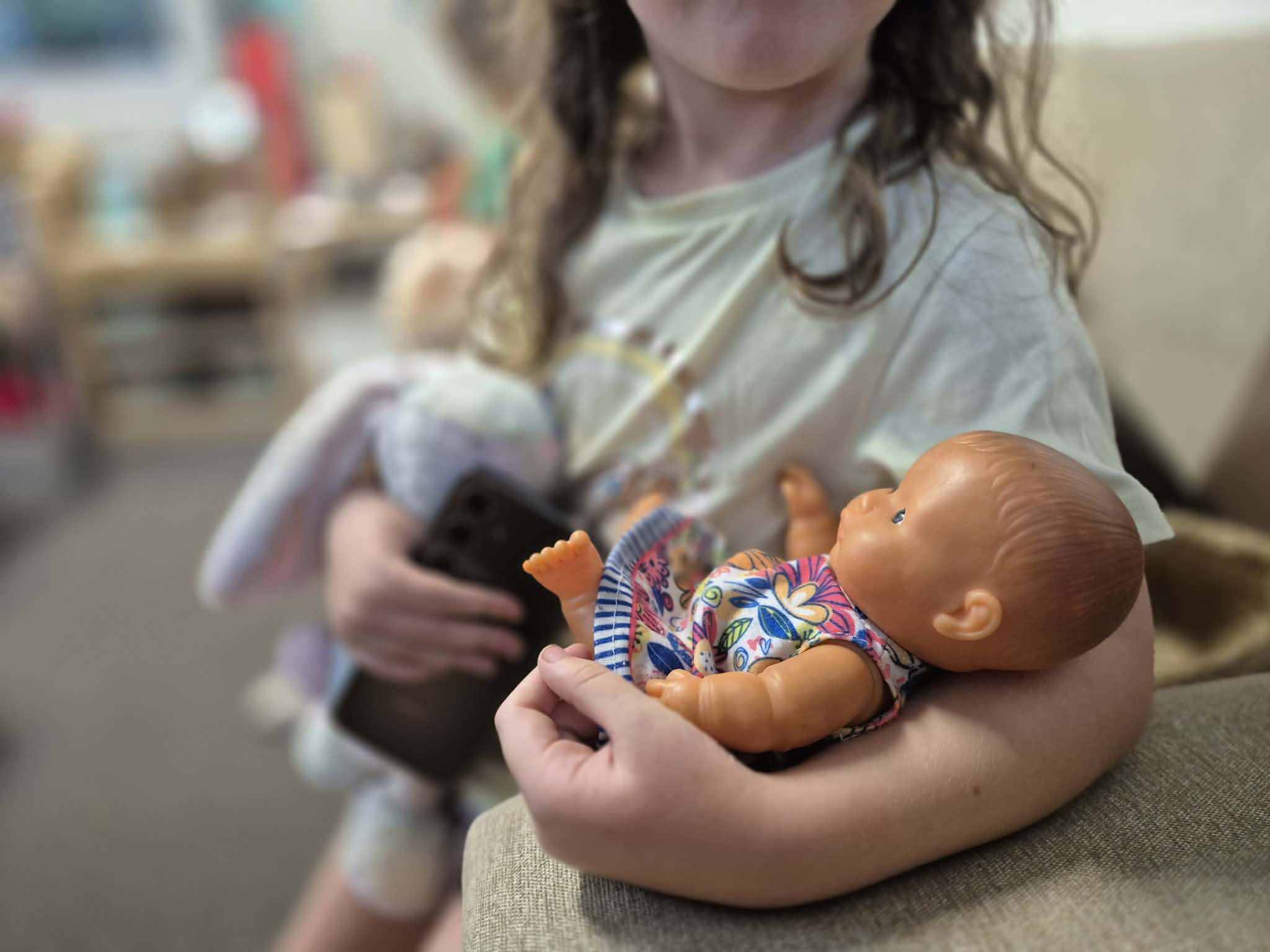 C&K Crescent Lagoon - child holding a doll