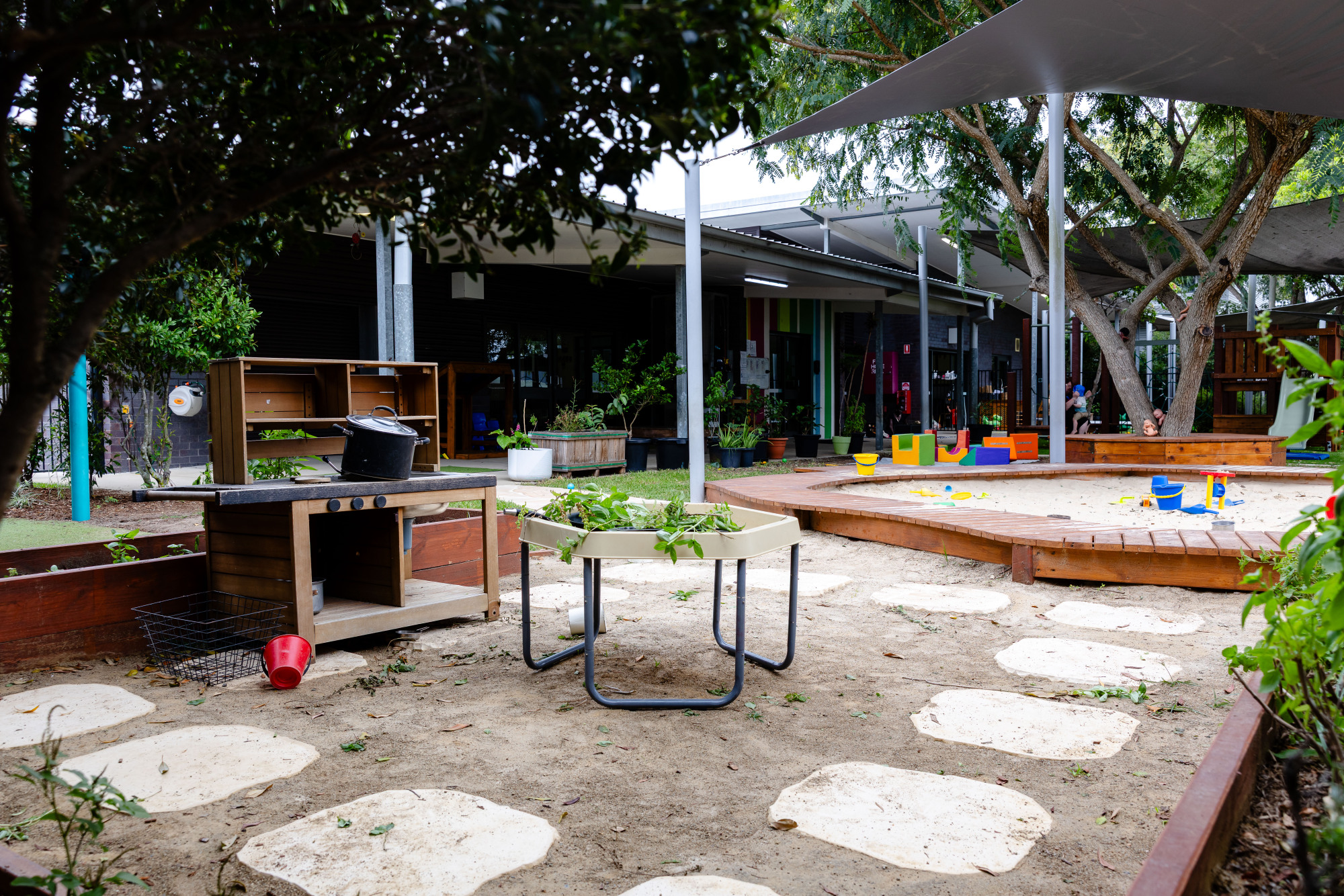 C&K Amberley - outdoor space with mud kitchen and sandpit
