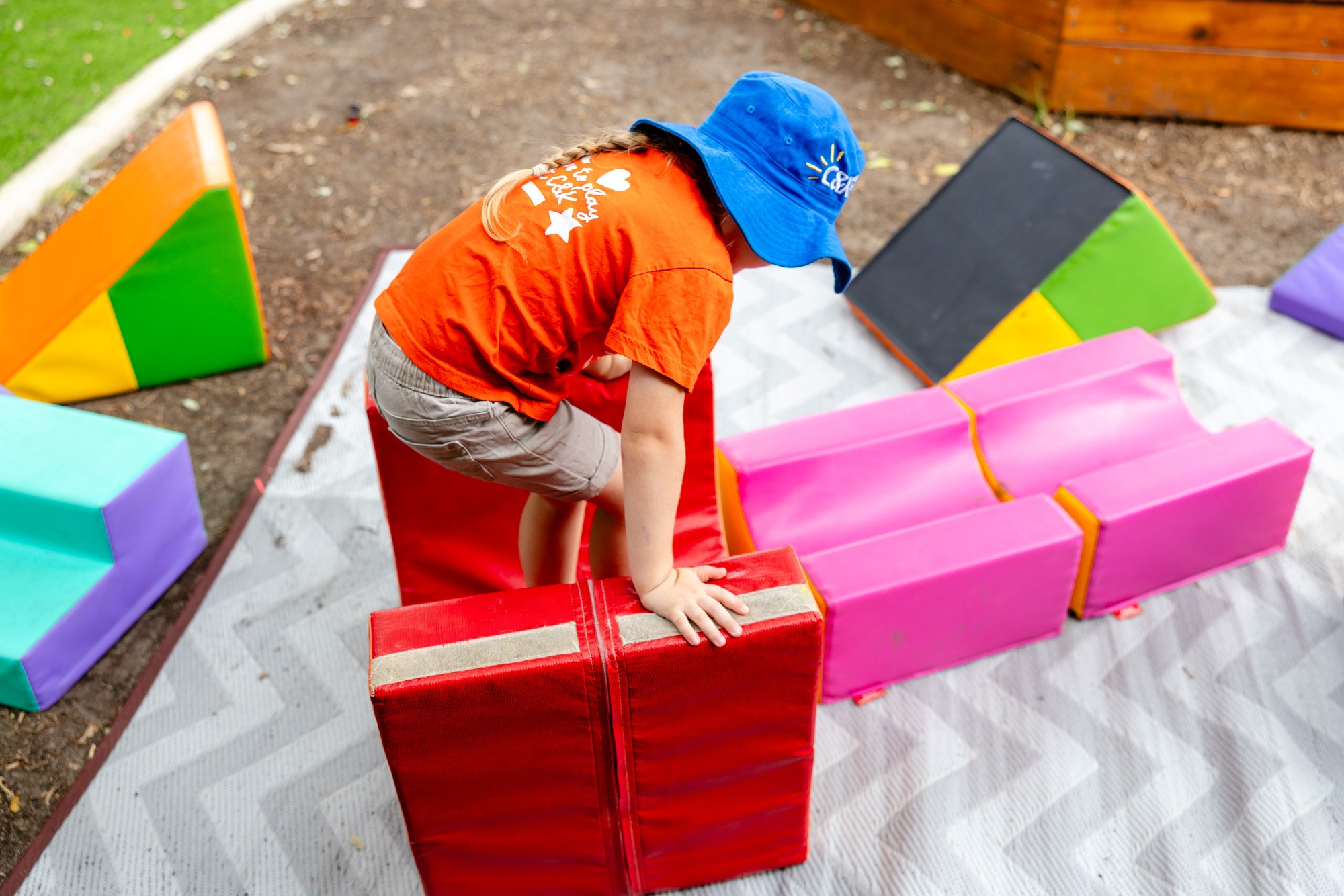 C&K Amberley - child climbing on soft play equipment