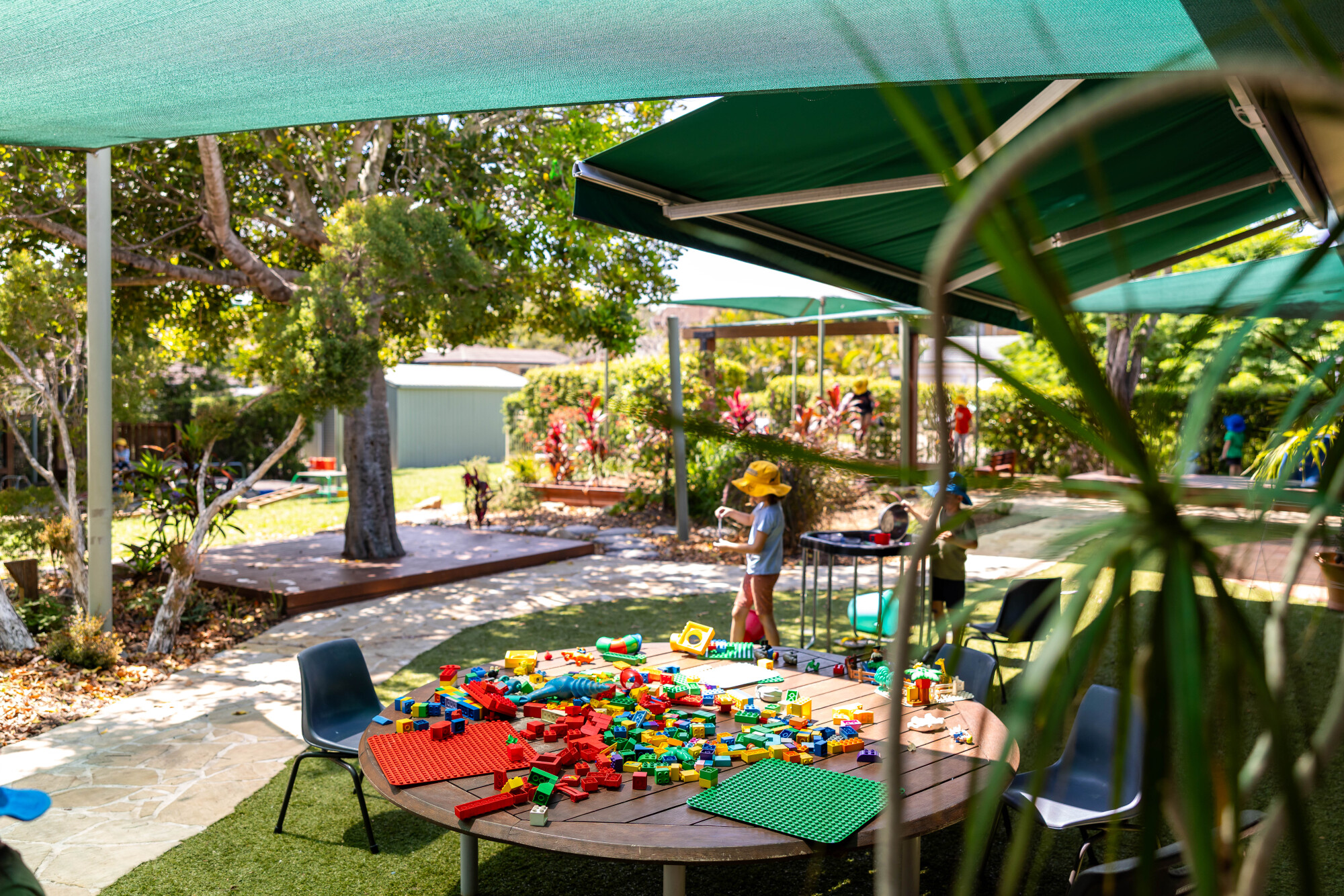 C&K Carindale - outdoor undercover space, including a table covered in duplo
