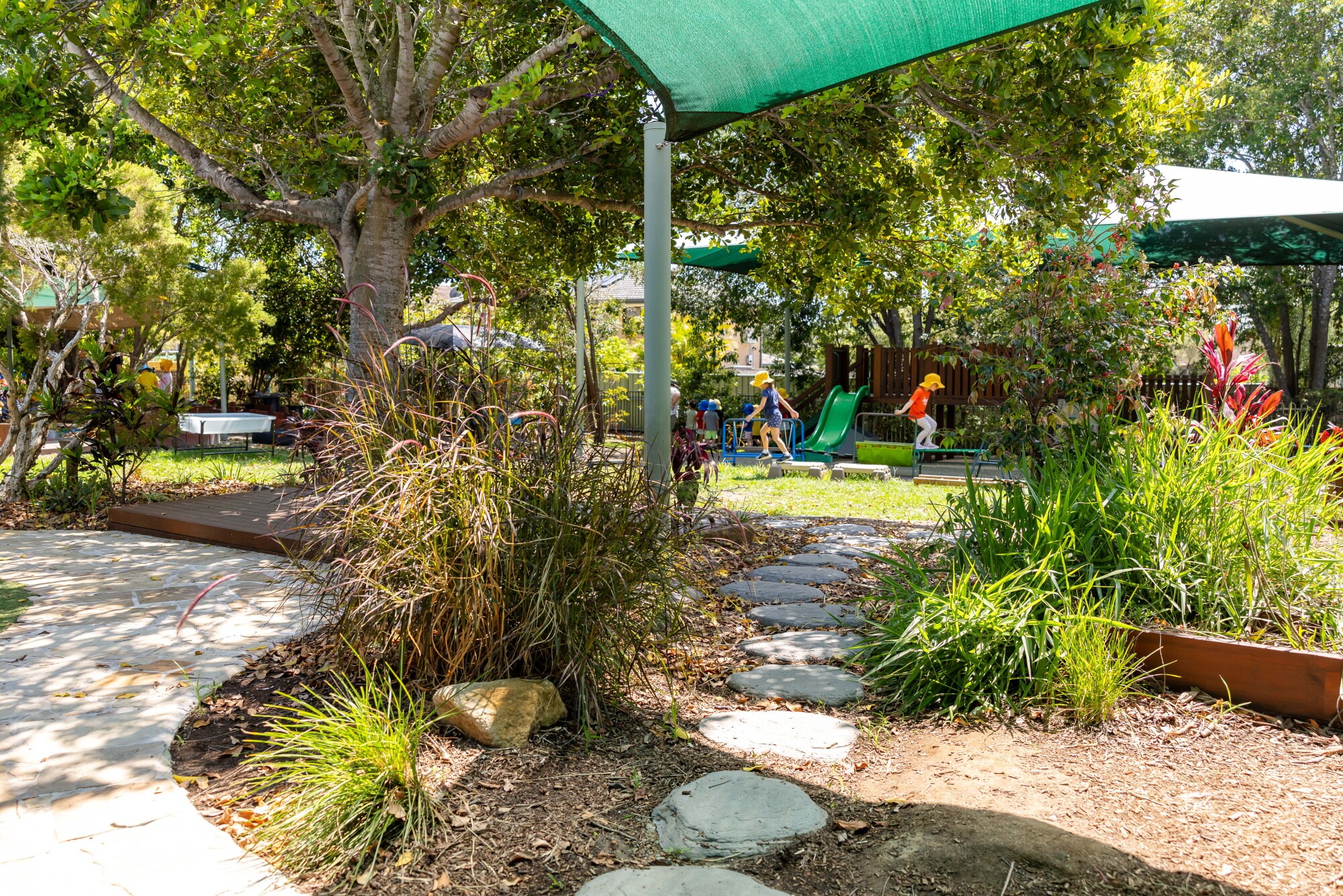 C&K Carindale - outdoor space with children playing on the playground in the distance