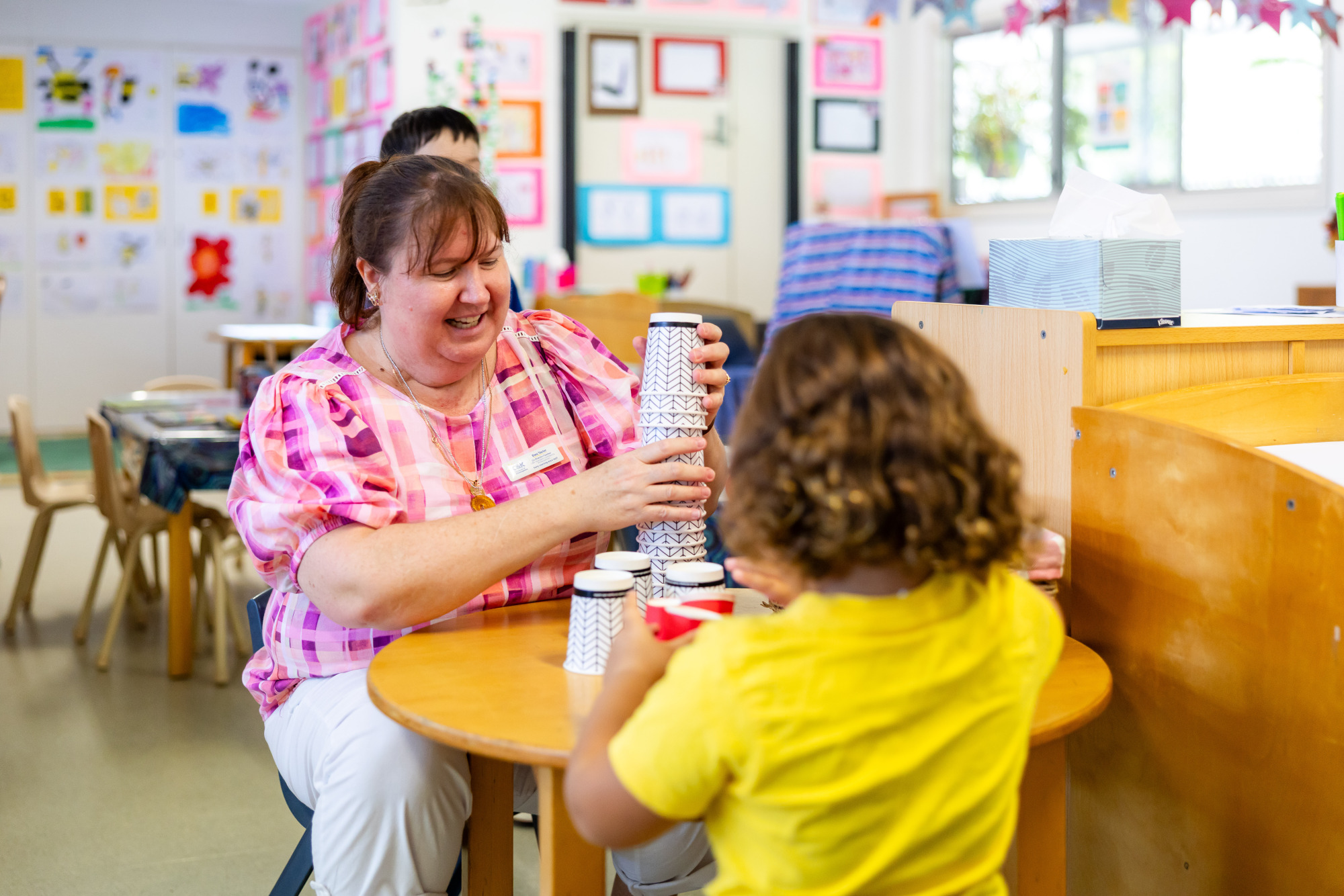 C&K Gumdale - teacher and child stacking cups