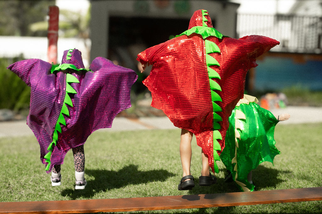 C&K Florence - children playing in dragon costumes
