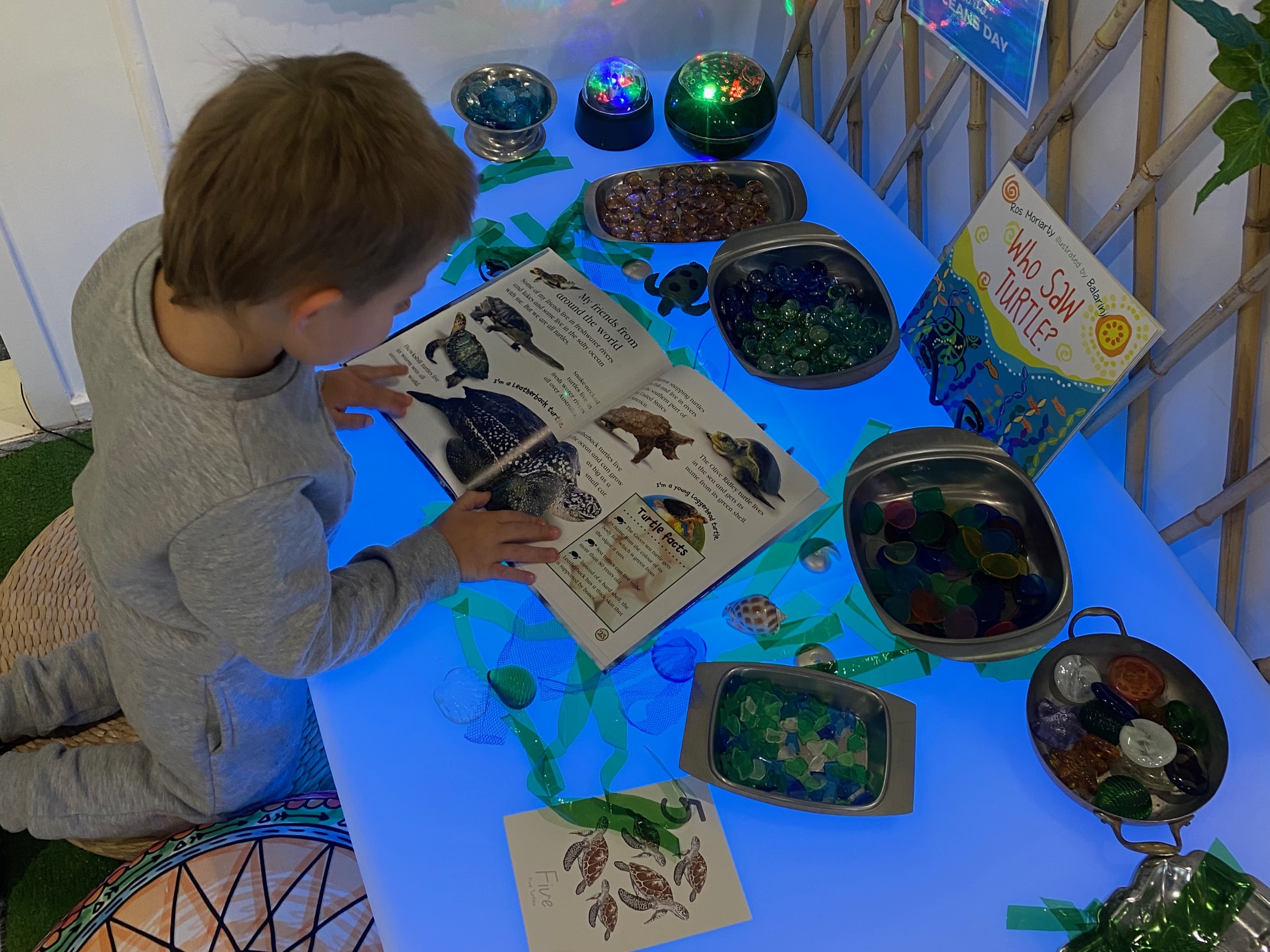 Texas & District Kindergarten - child playing with resources