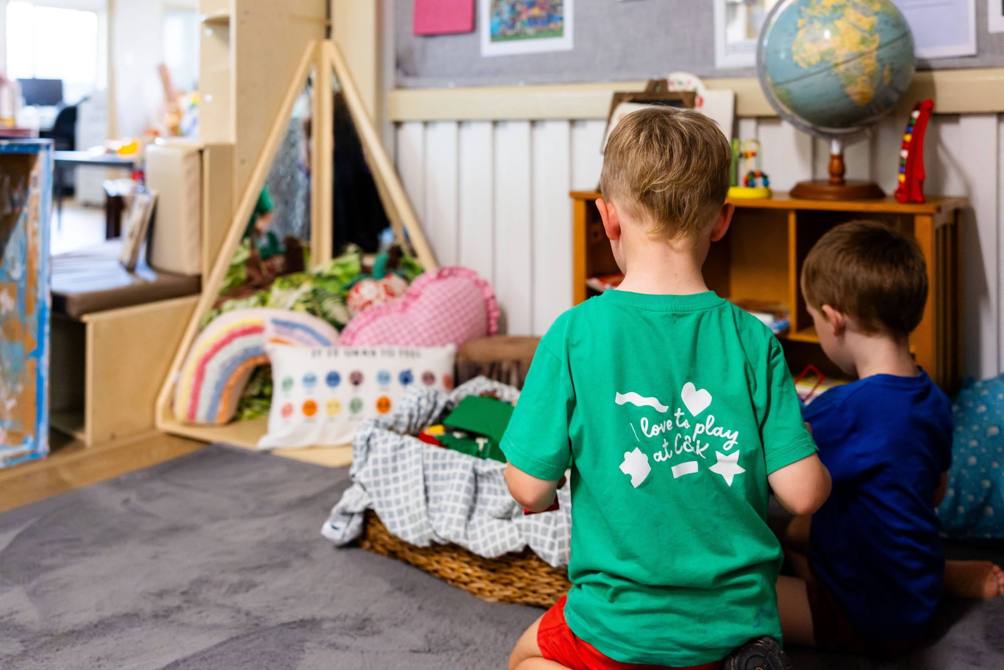 C&K Kilcoy - children playing together in a quiet corner inside