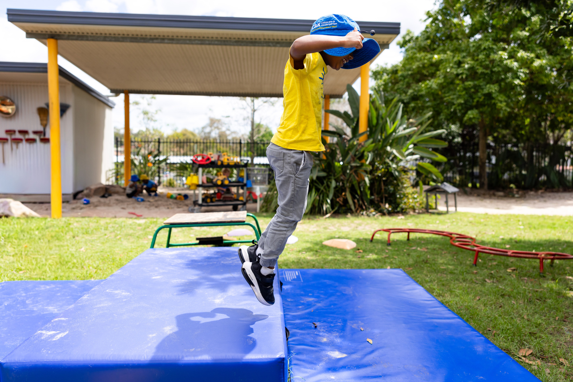 C&K Mt Gravatt East - child jumping on an obstacle course