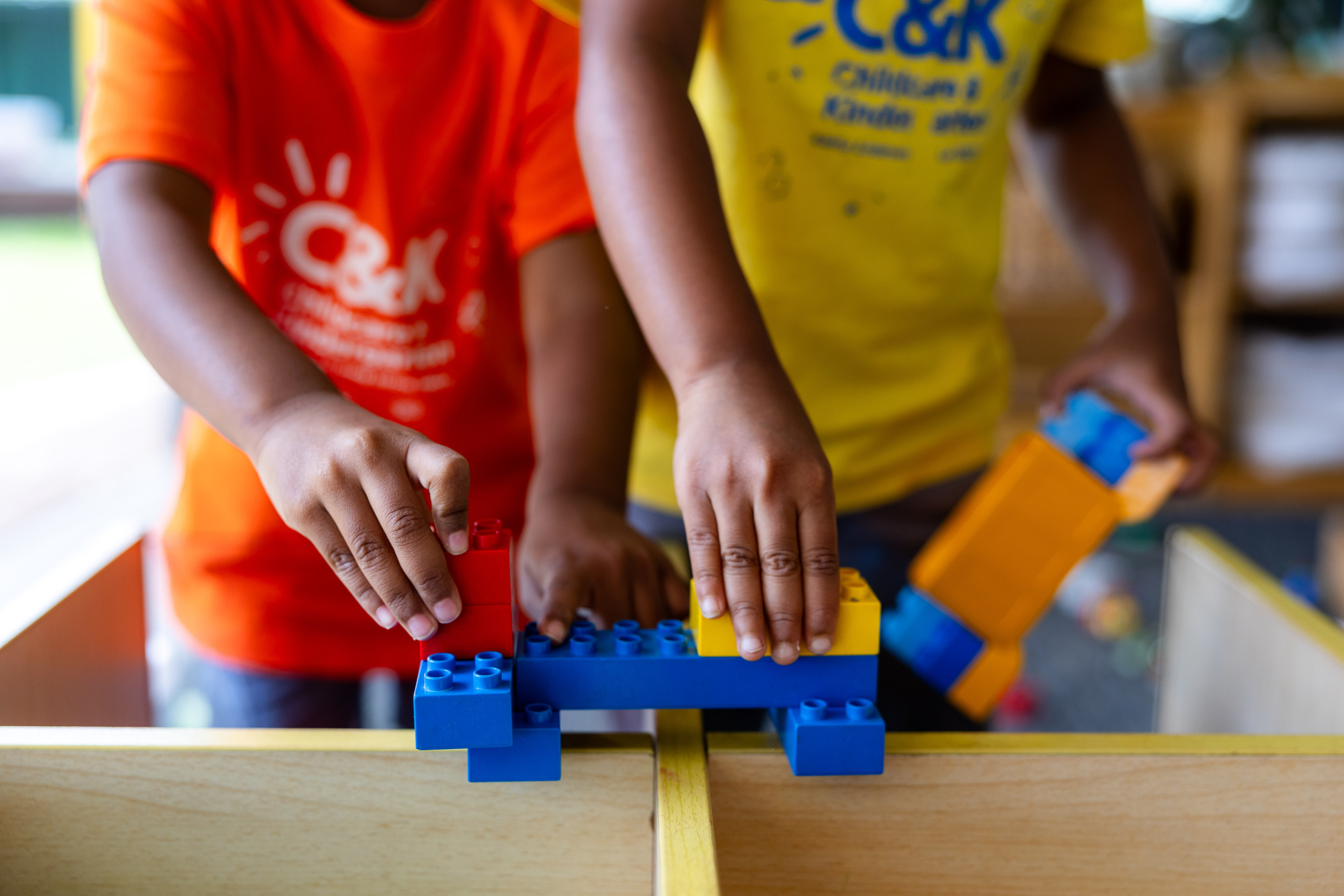 children playing with duplo
