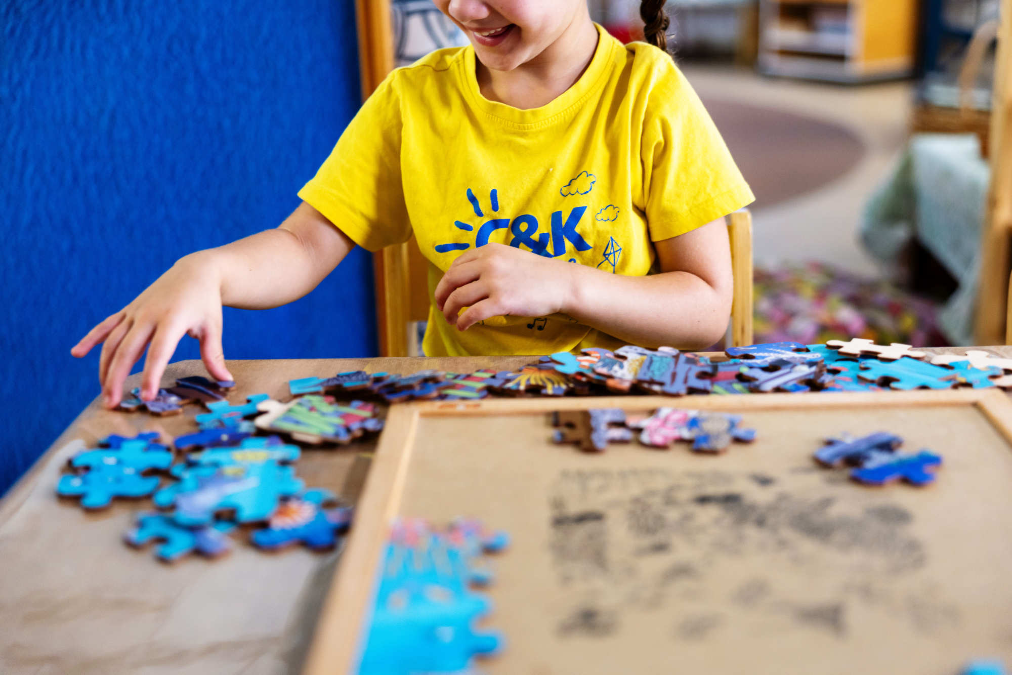C&K Redlands - child doing a puzzle