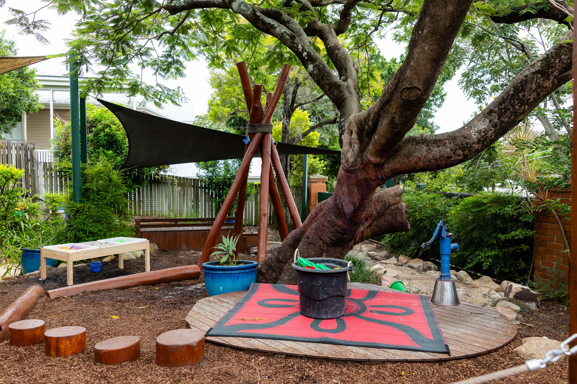 C&K Rosalie - outdoor yarning circle under a large established tree