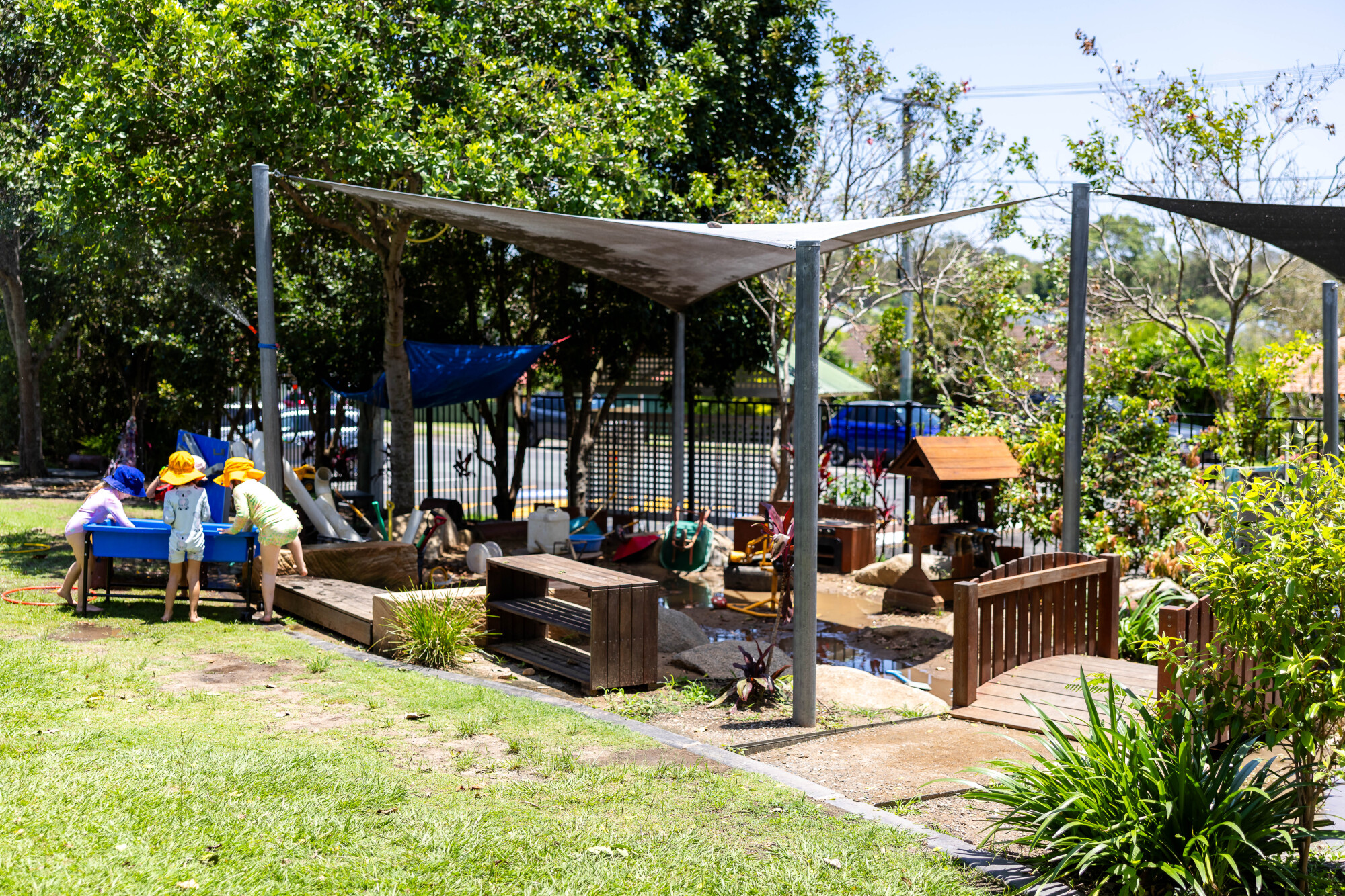 C&K Rochedale South - children engaged in water play