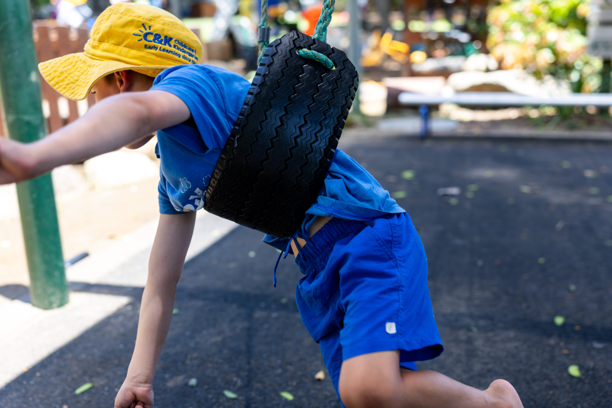 C&K Rochedale South - child on a swing