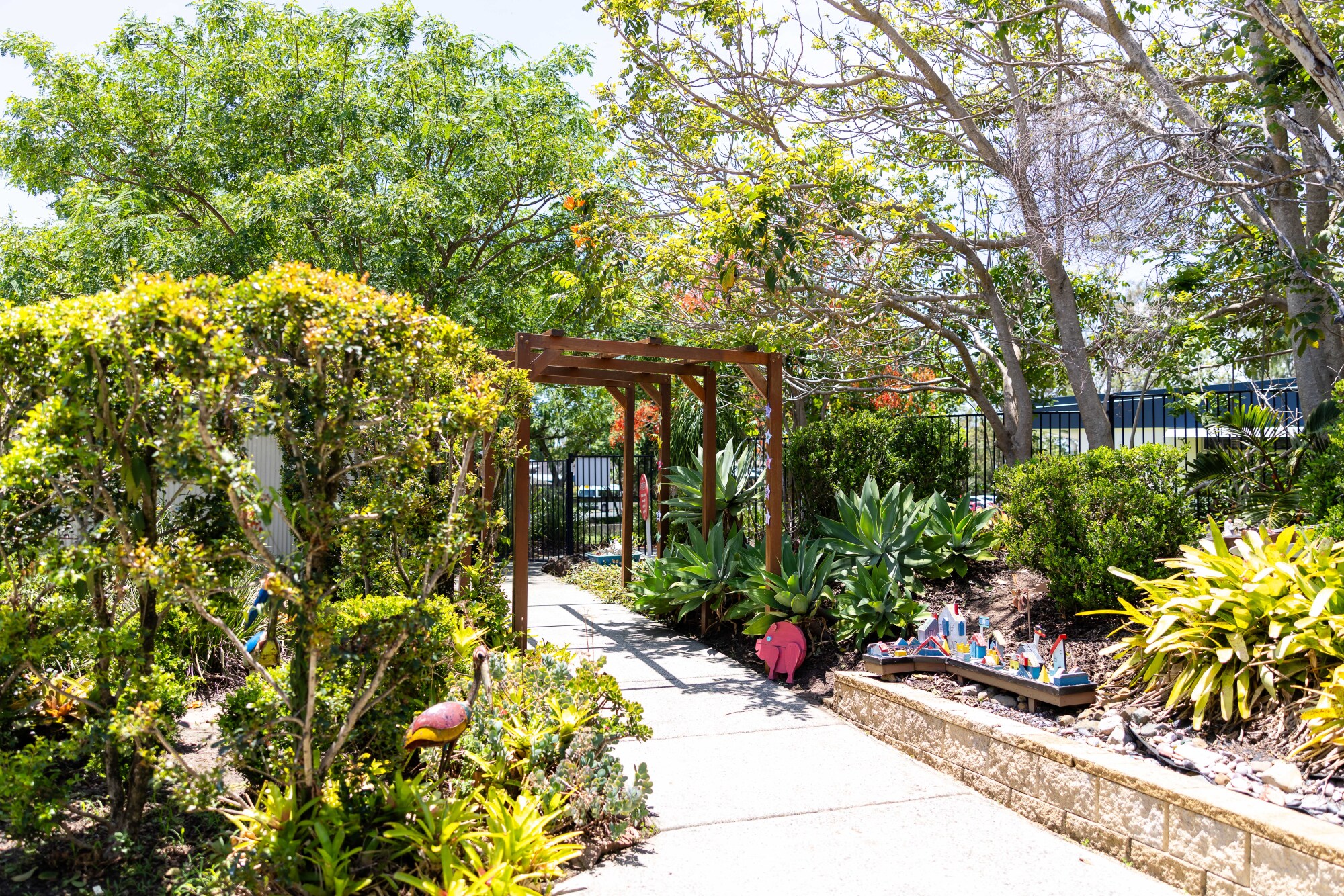 C&K Rochedale South - outdoor walkway with miniature village