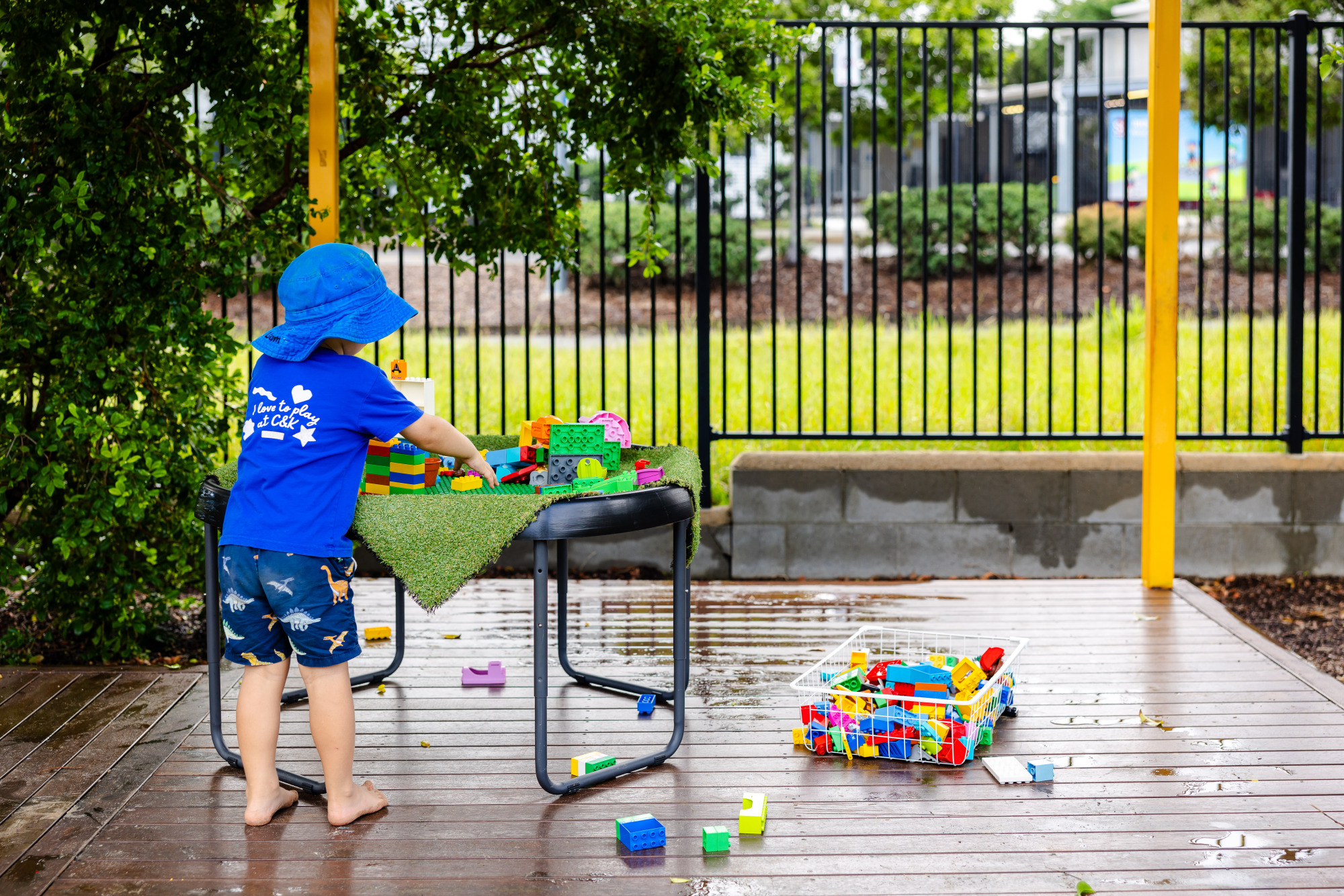 C&K Springfield Central - child with building blocks outdoors