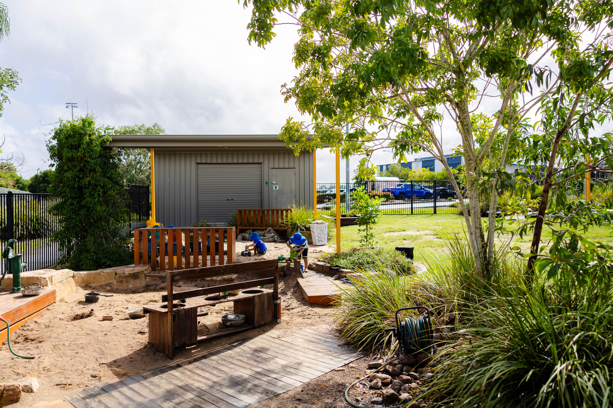 C&K Springfield Central - children playing outdoors in the sandpit