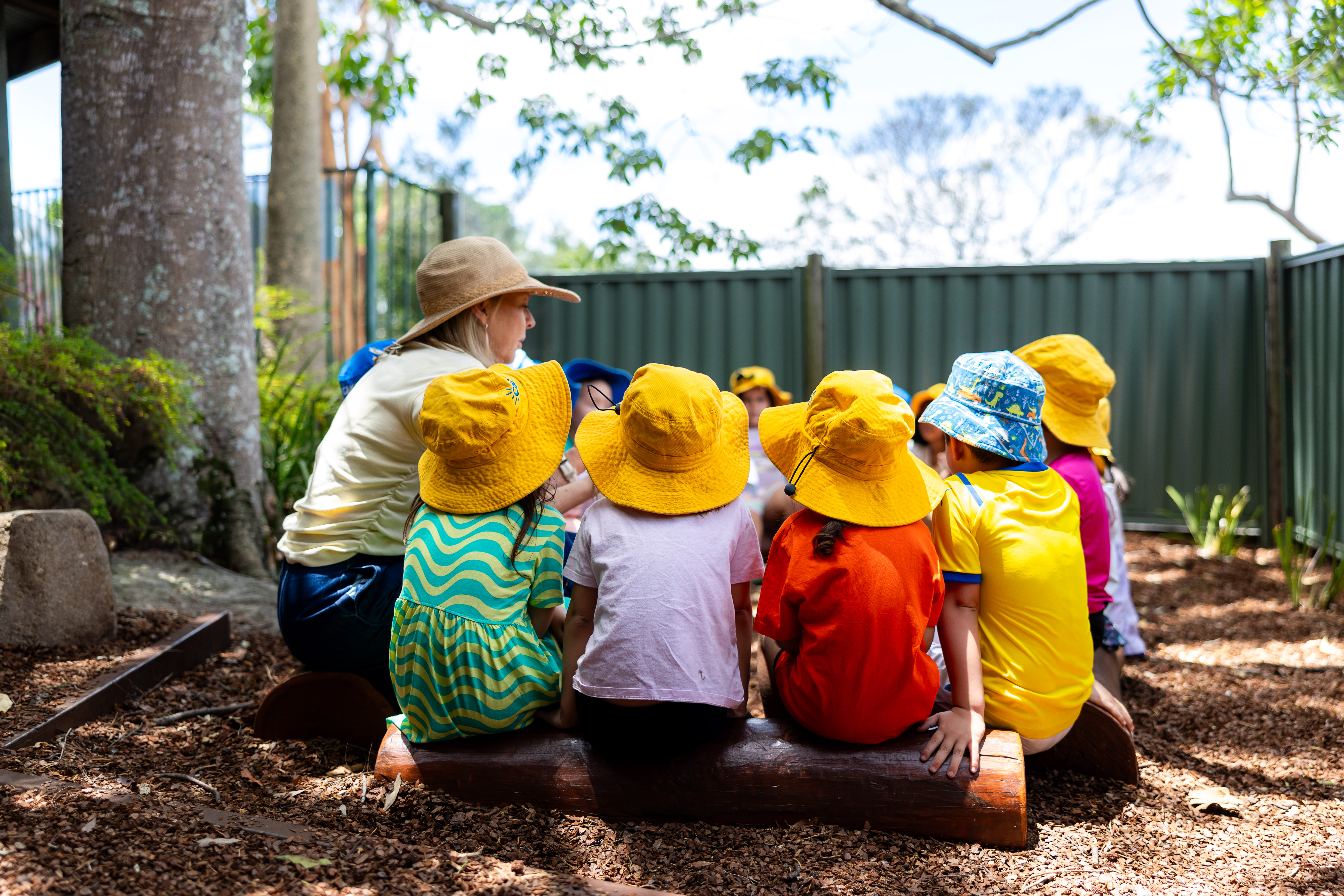 C&K St Catherine's - group time outdoors at the yarning circle