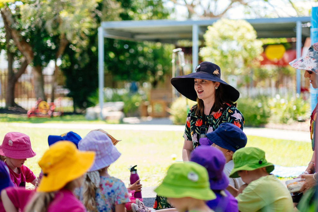 Florence kindy teacher and children outside