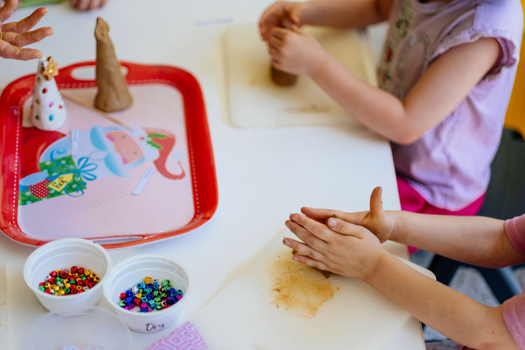 Florence kindy children playing with clay