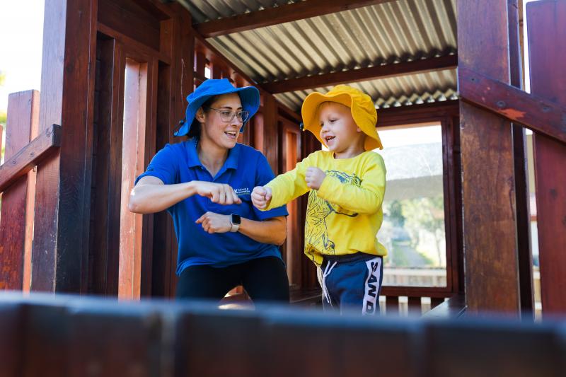 C&K Educator and child dancing together