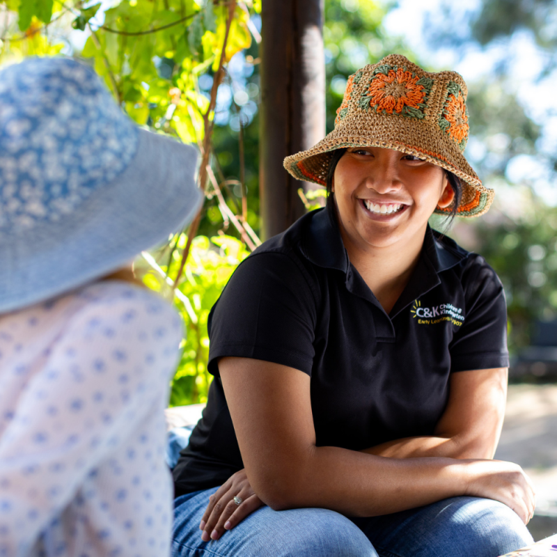 Home page slider 3 - relaxed educator smiling at child