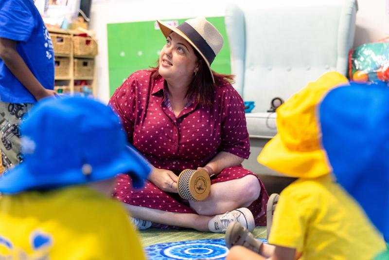 C&K educator engaging with kindy children